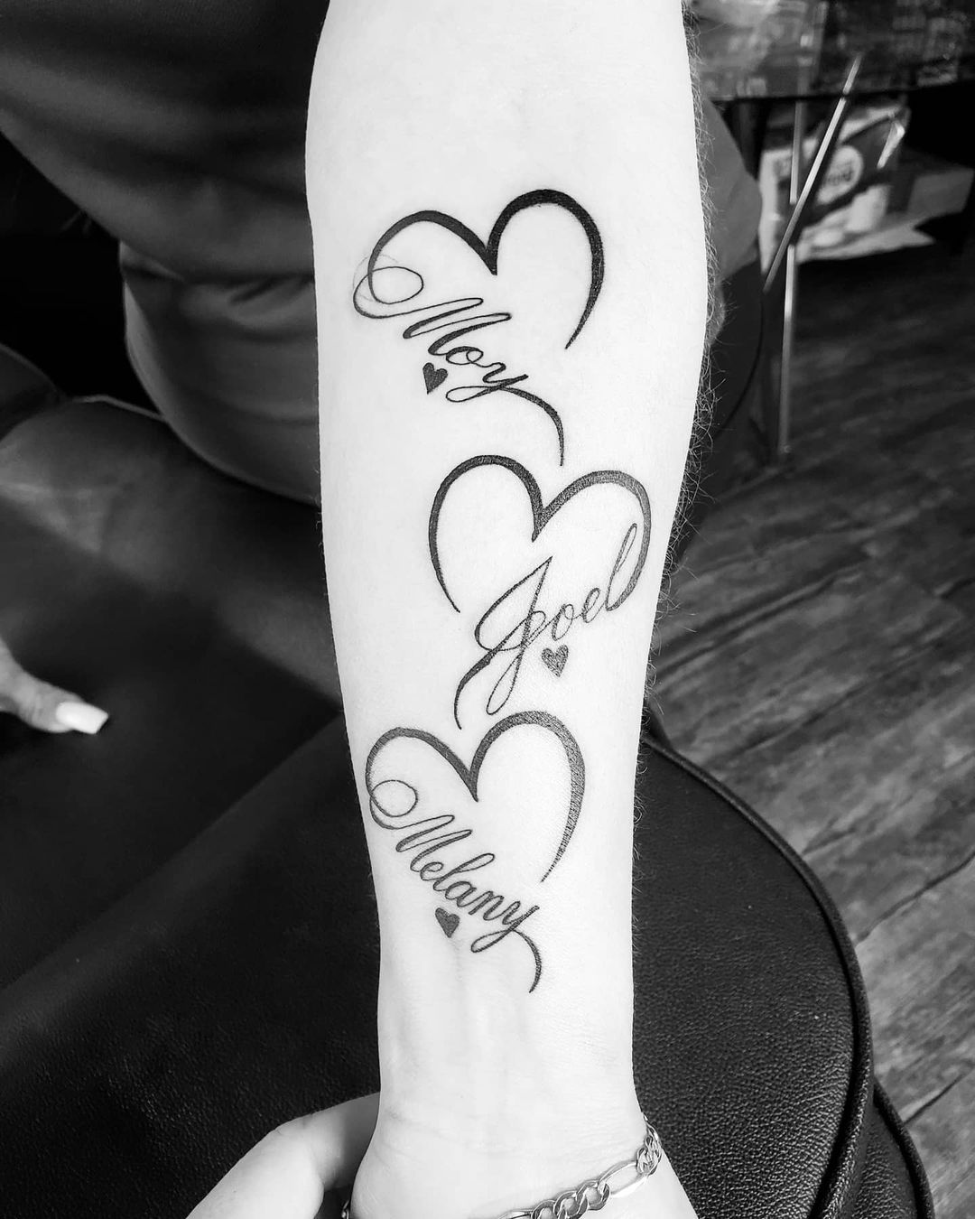 heart tattoos with names in them