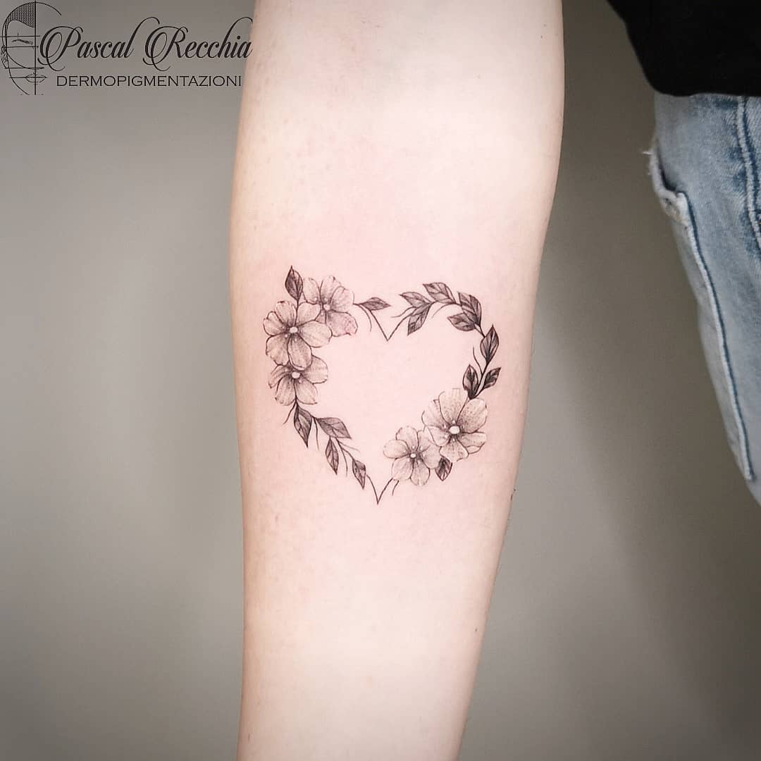 Beautiful floral heart by Daniel O from Meticulous Tattoo in Austin TX   rtattoos