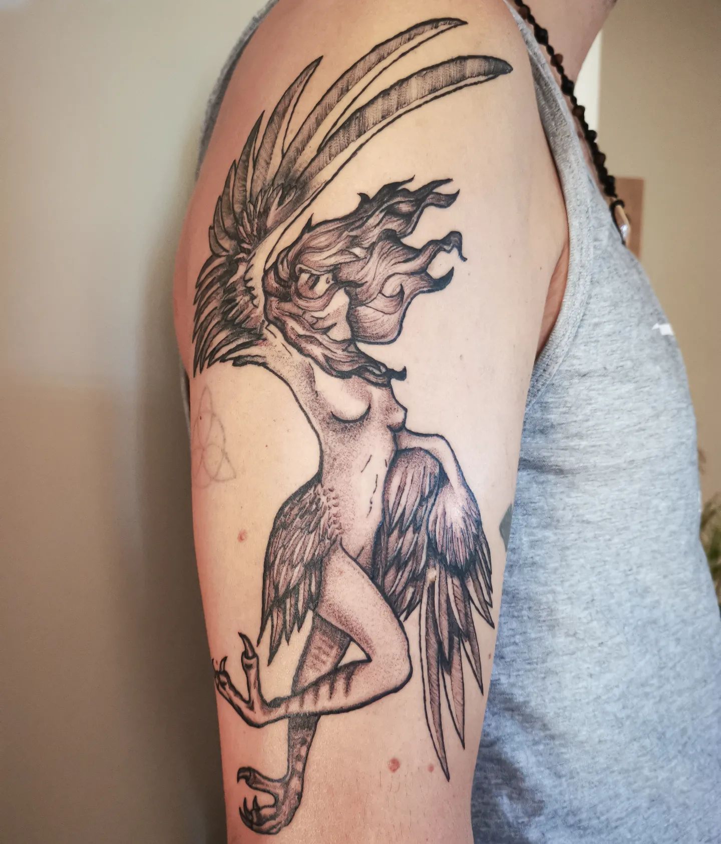 This mythological creature is both scary and fabulous to look at. Let's get a tattoo of Harpy.