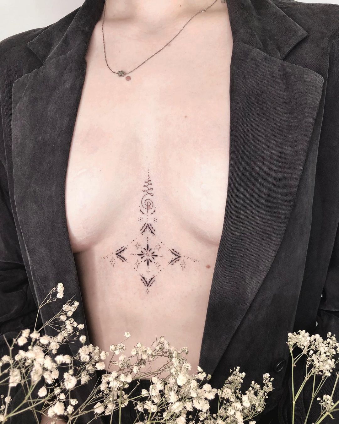 The Ultimate Guide to Sternum Tattoos Meaningful Art and Care Tips    Chronic Ink