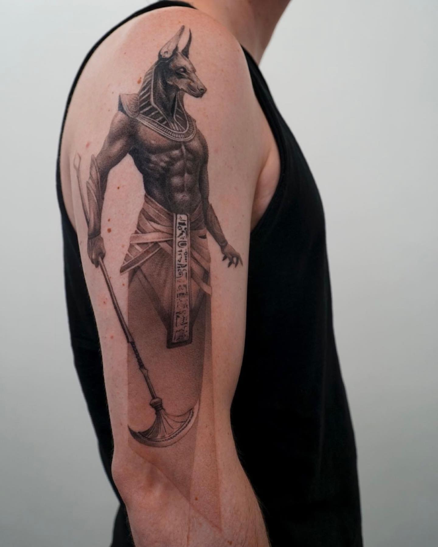  If you want to get a shady Anubis tattoo, this design will suit on you.