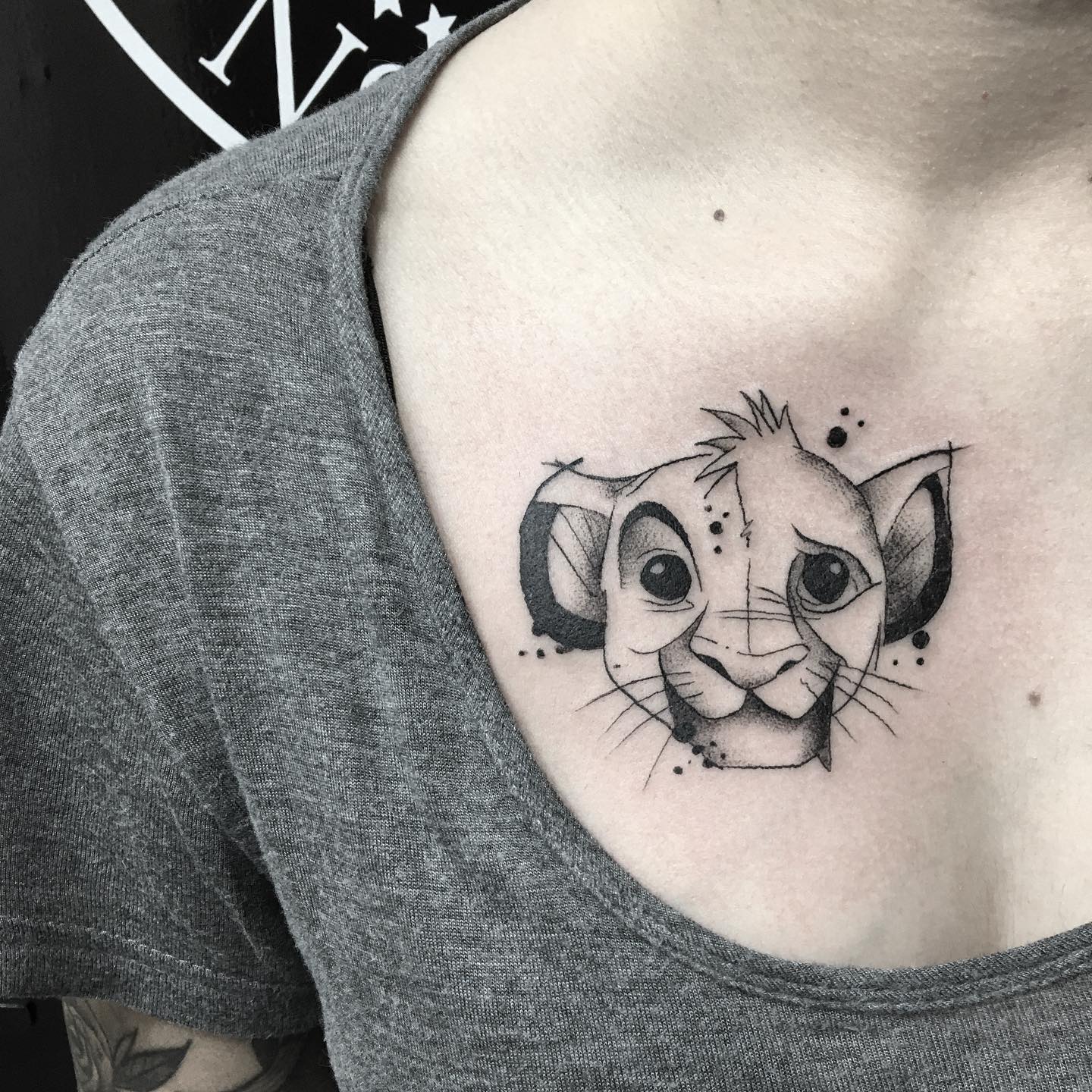 Everyone will notice your pretty lion cub tattoo.