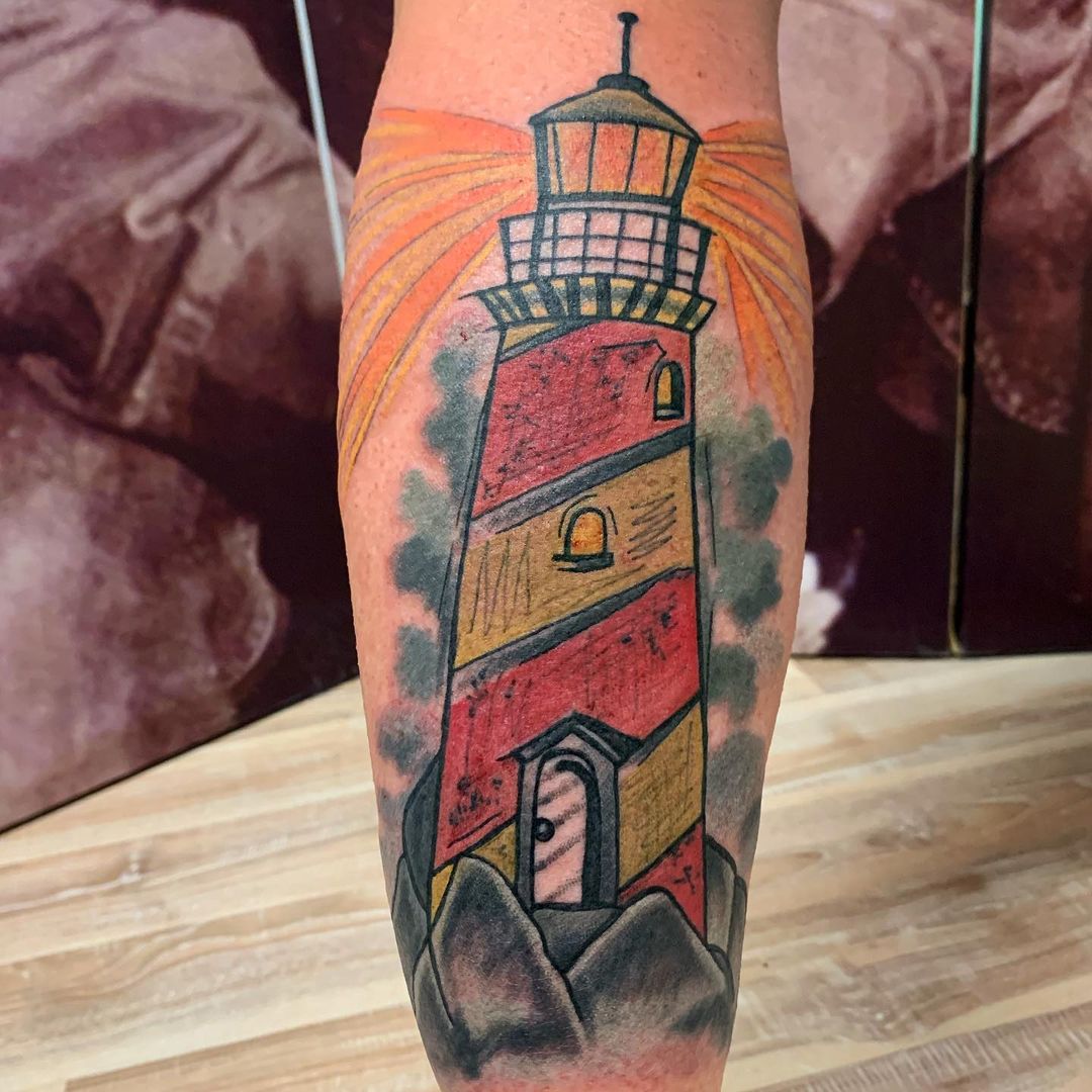 Traditional lighthouse tattoo on the thigh  Tattoogridnet