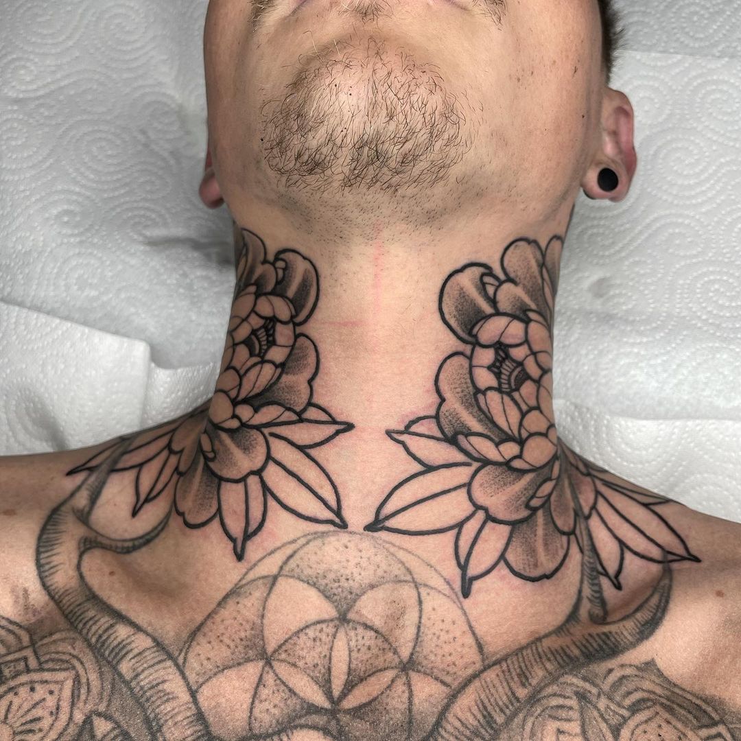 Lotus Flower Neck Tattoo