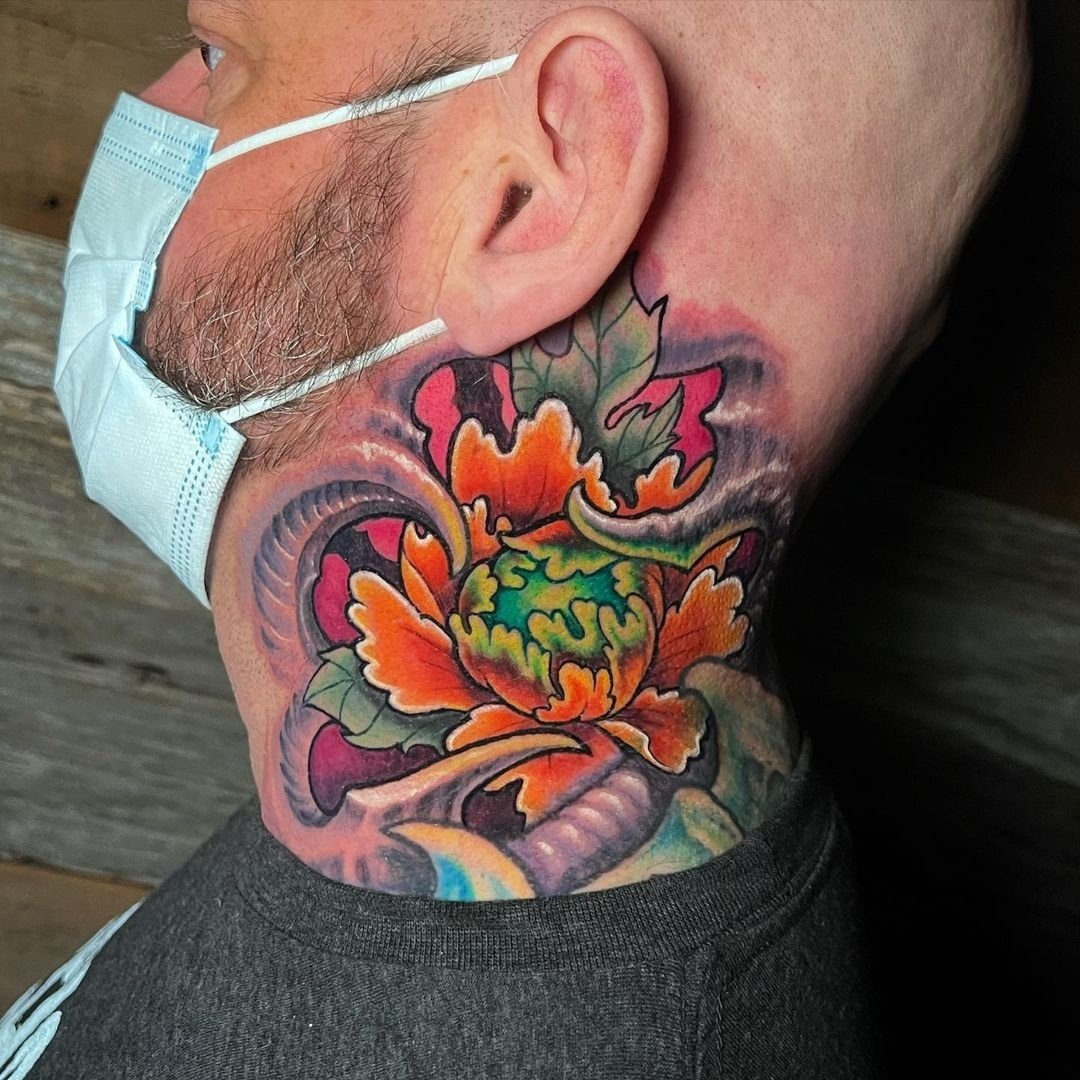 With this colorful peony tattoo, your neck will turn into a lively backyard.