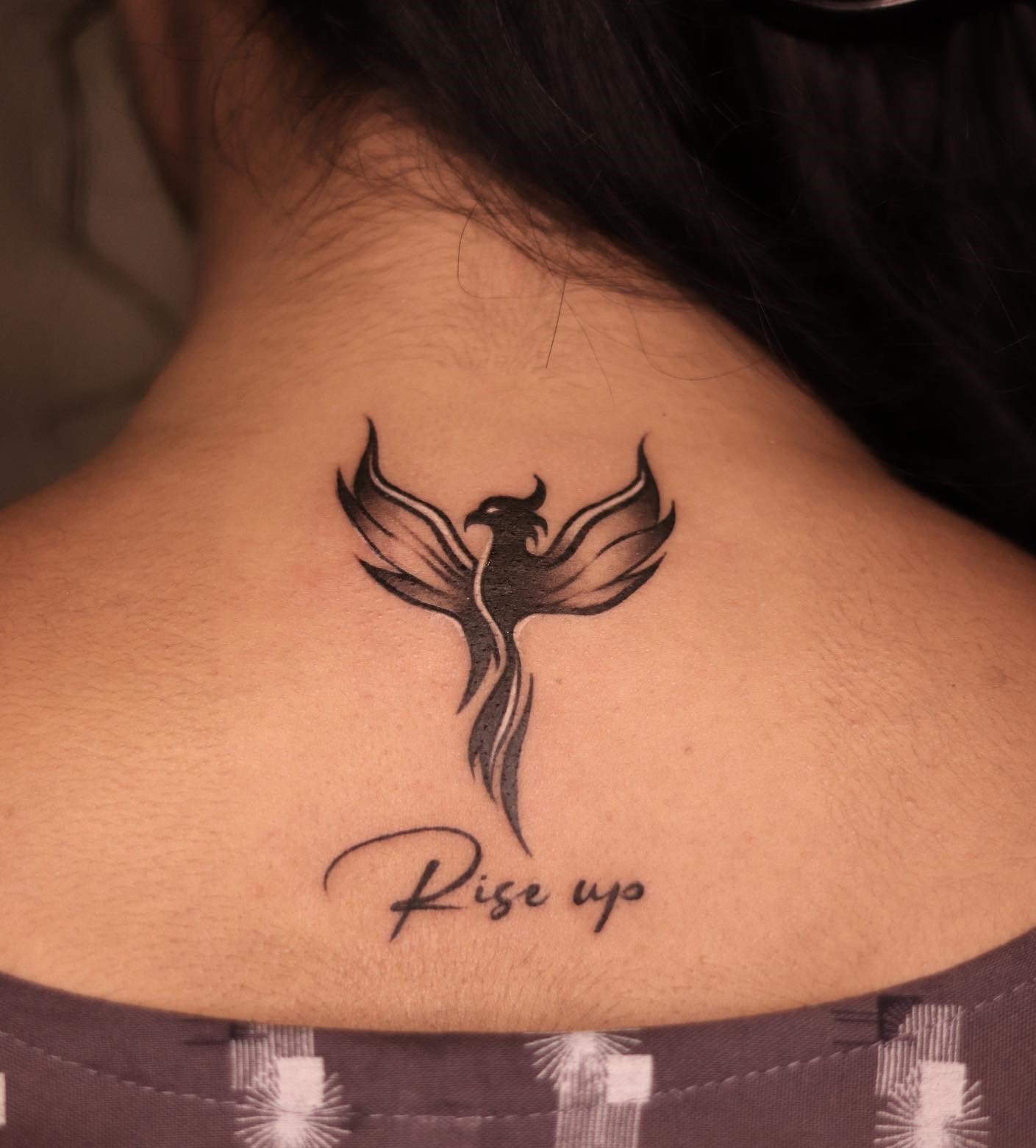 Phoenix rises from the ashes and with this phoenix tattoo on your neck, you will indicate that you cannot be humiliated and vanished.
