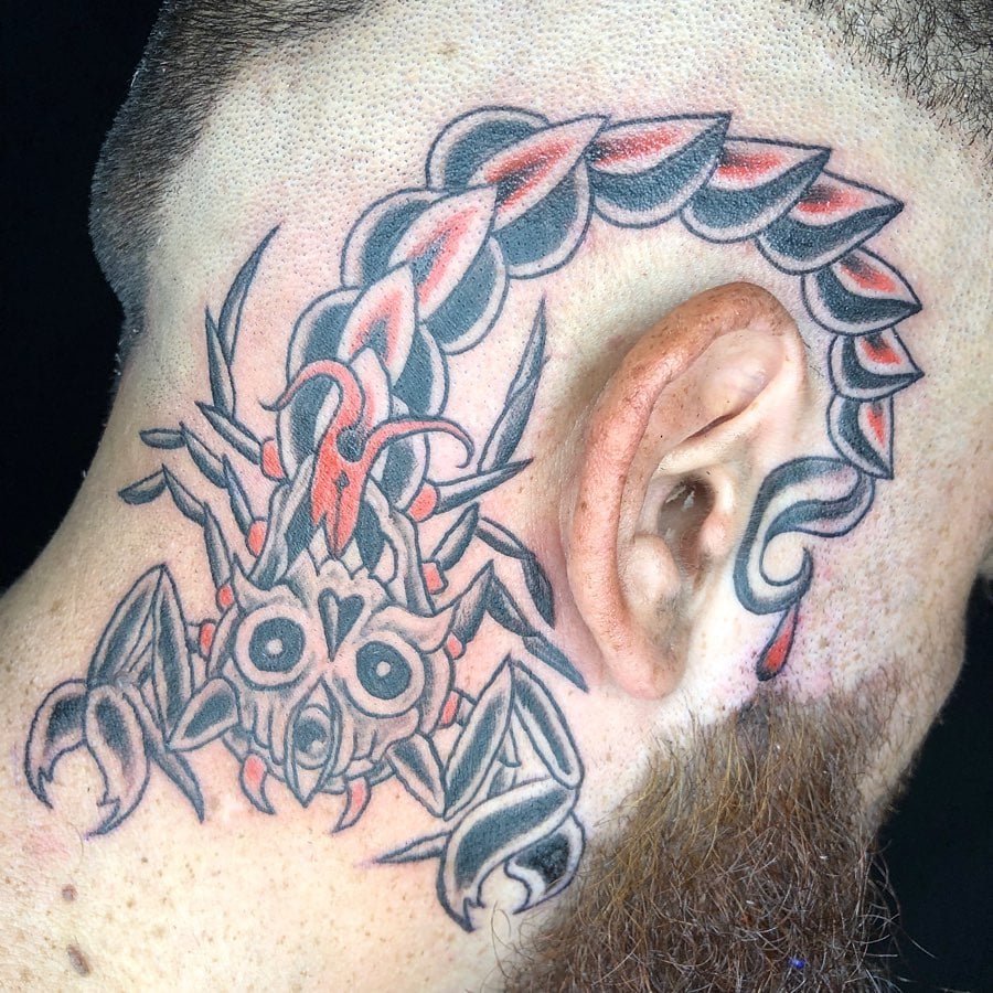 Such an amazing scorpion design on neck... It is sure that no one will ask for trouble when they see this tattoo.