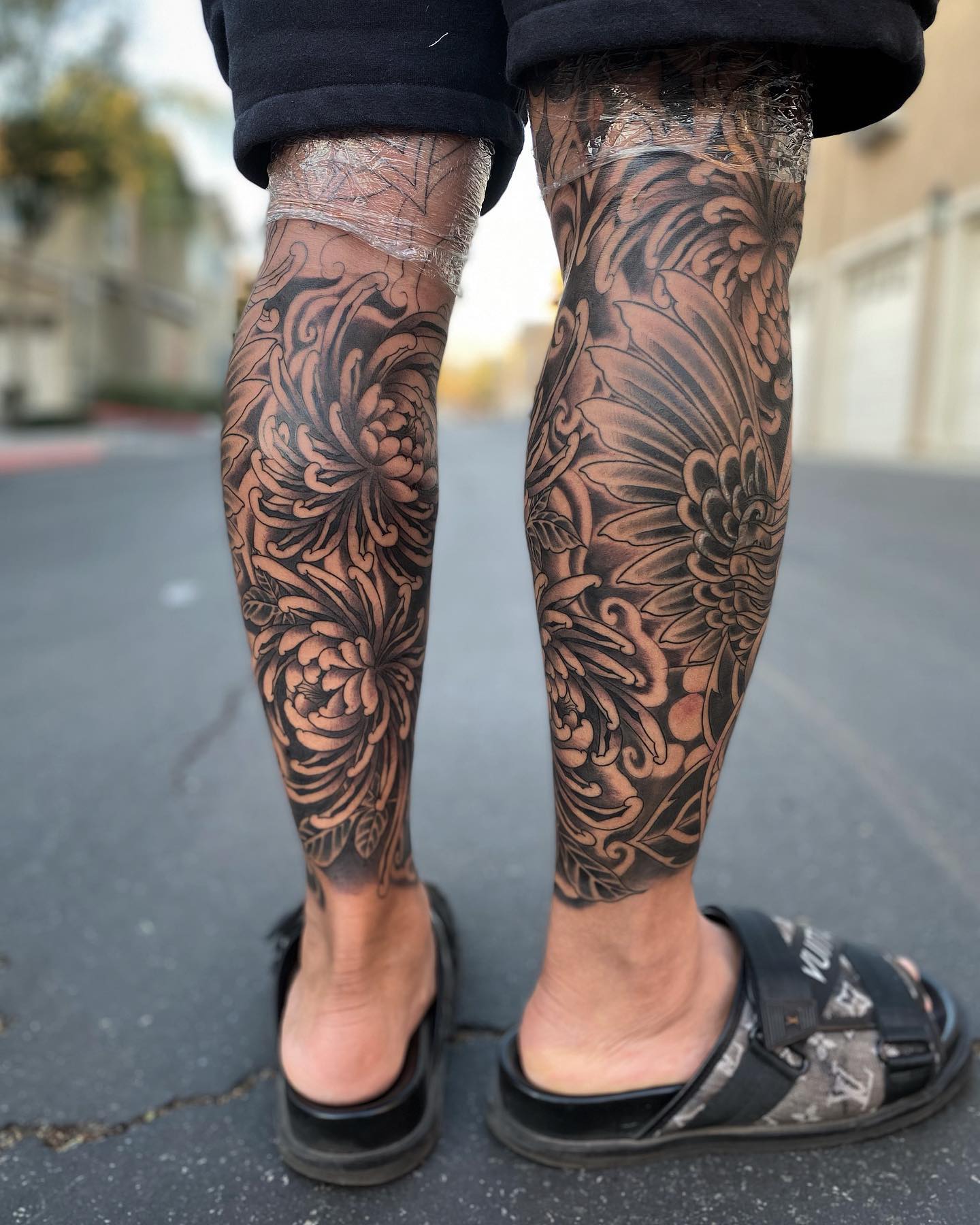 Male calf tattoos