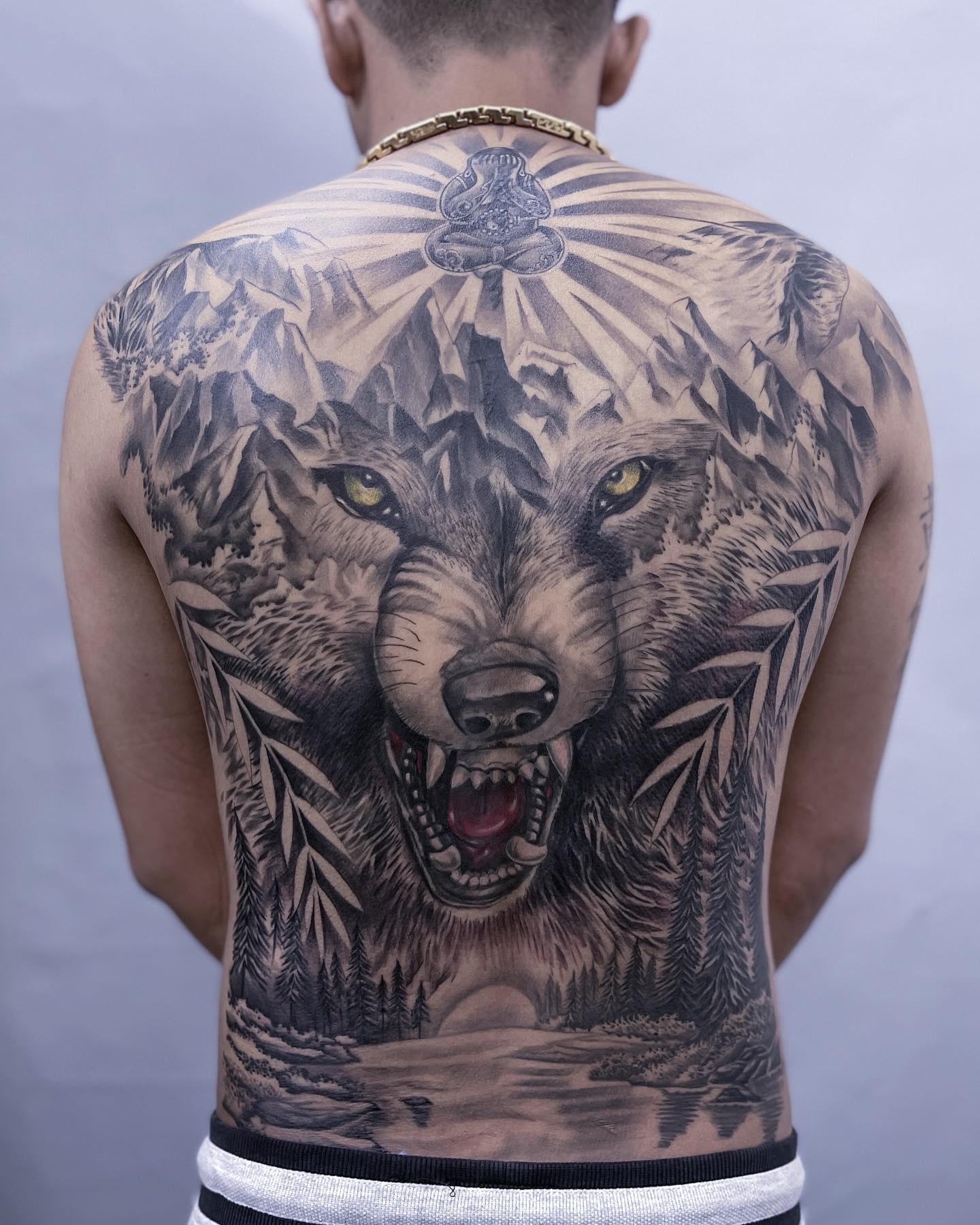 This fantastic design is made by depicting the host of the forest. Undoubtedly, tattooist must know how to harmonize wolf with other stuff.