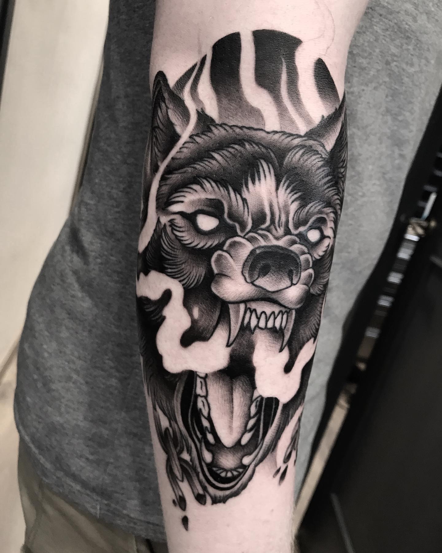 This dreadful wolf tattoo design will be perfect on your forearm.