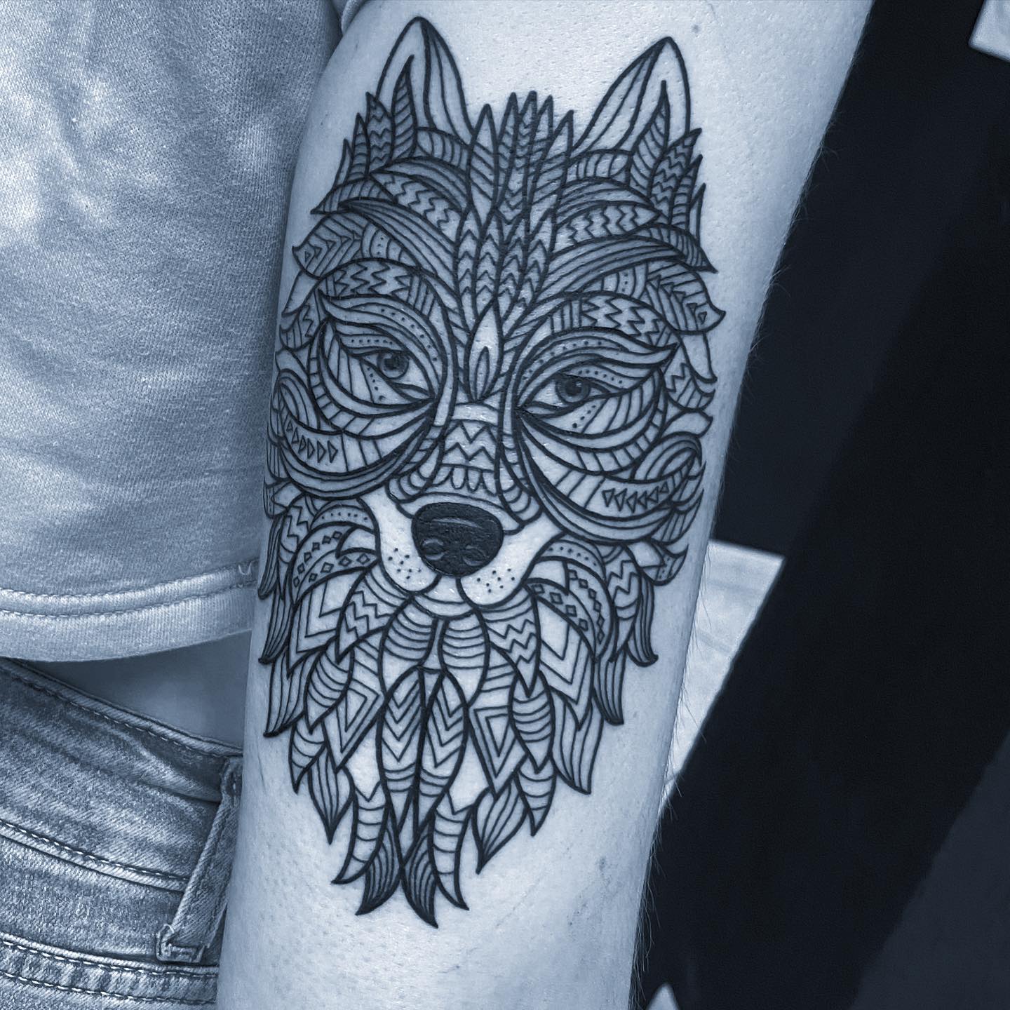 Detailed wolf tattoo design for the lovers of meticulous work.