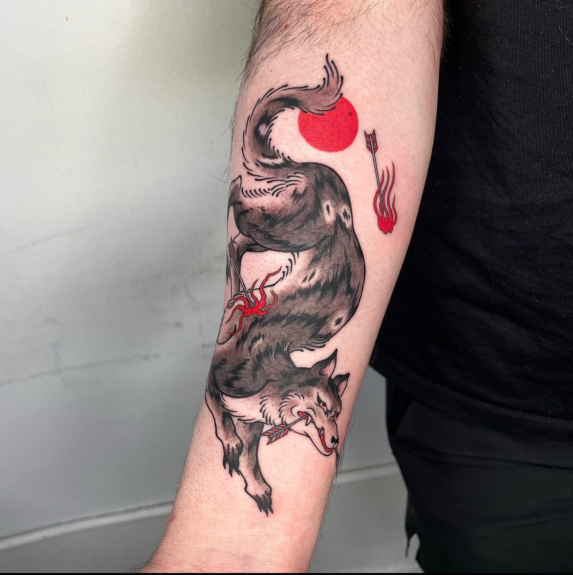 Except for the other wolf tattoos, this design is highly influenced from traditional Japanese art.