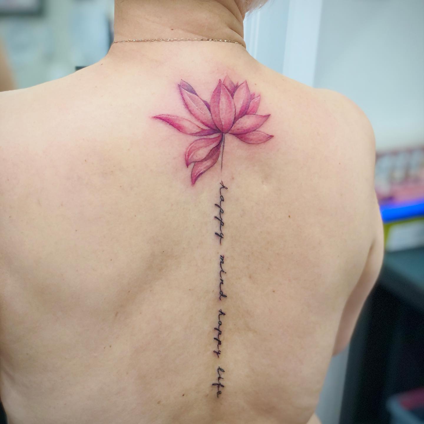 Carloz Tattoos Carl Heggarty on Twitter Different piece from today  colour lotus flower with quote running down spine Like Retweet Comment   httpstco7HOw19wKJC  Twitter
