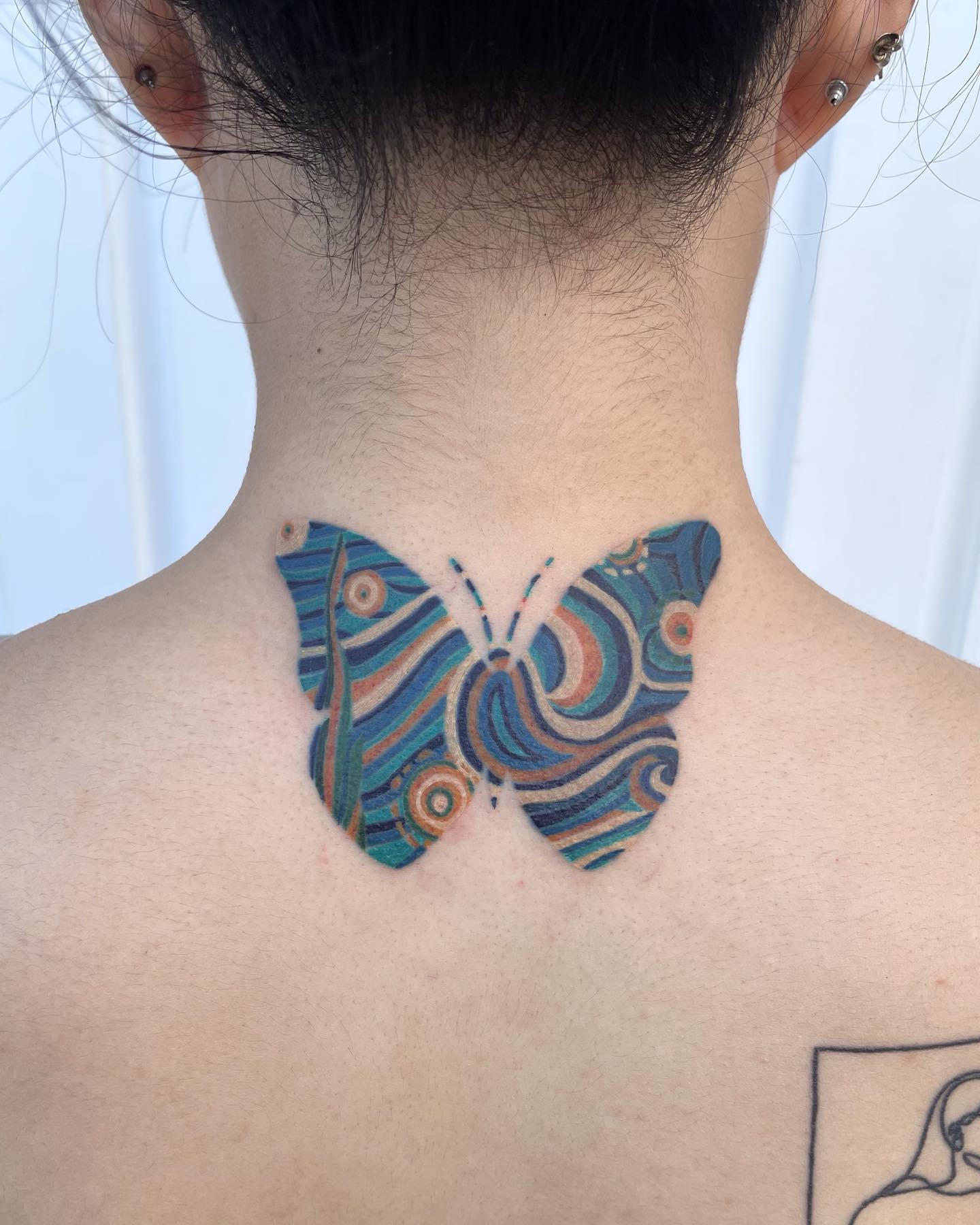 Classical Blue butterfly neck tattoo