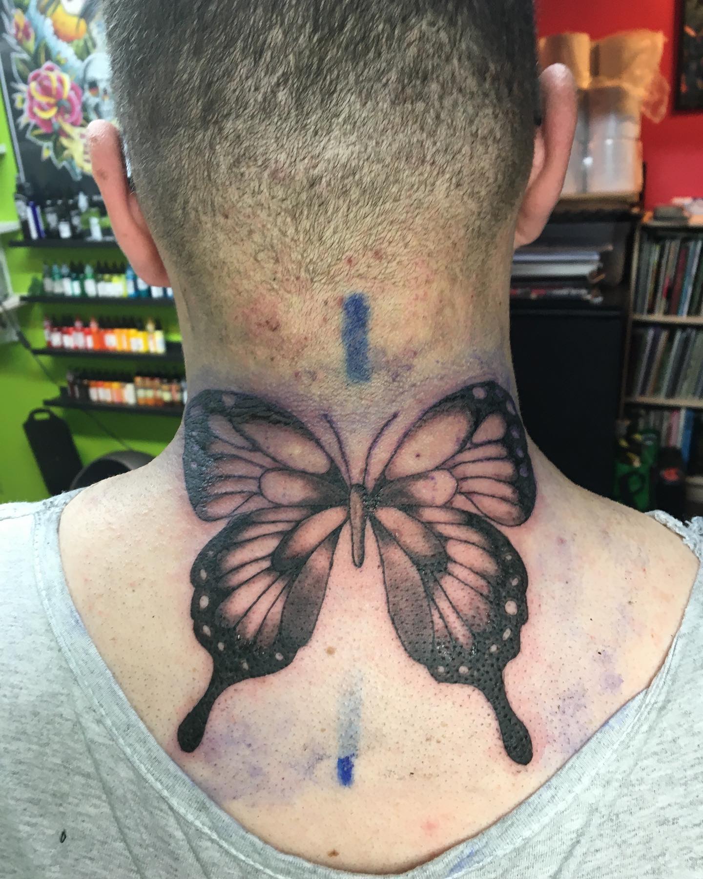 A woman with a butterfly tattoo on her back photo  Free Étatsunis Image  on Unsplash