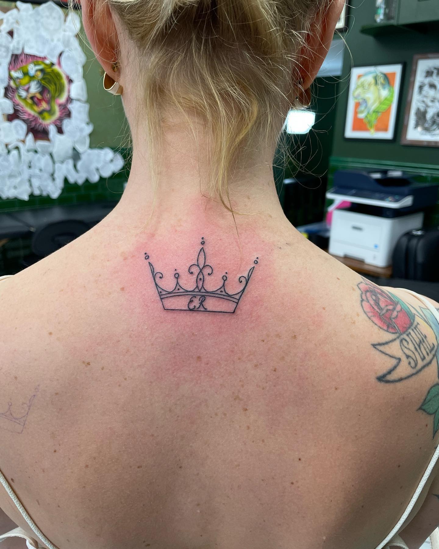 Banner And Crown Tattoo On shoulder