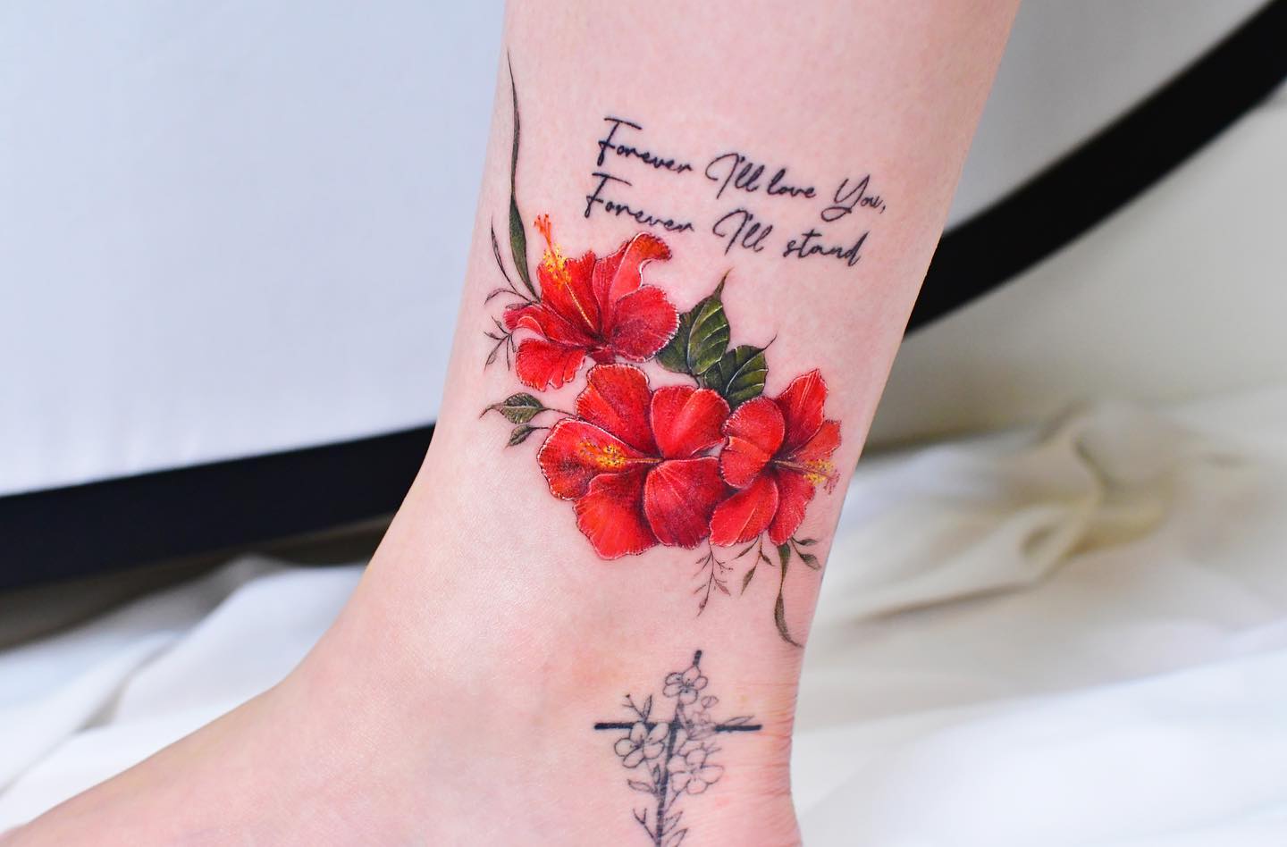 Try out a rose tattoo and place your favorite quote right next to it. Women who are sensitive, and feminine and those who are always looking for a fun and elegant design that can represent their romantic side will enjoy this concept.