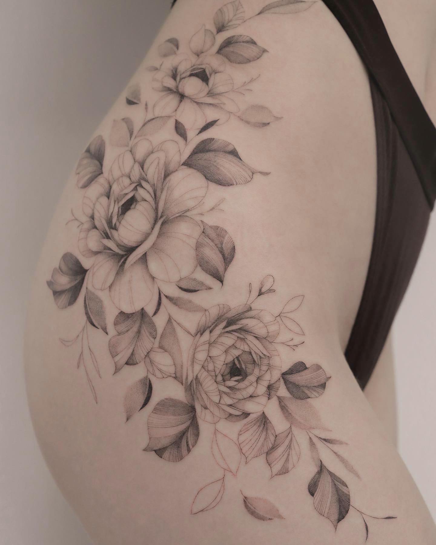 If you’re sensual and feminine and you truly love flowers, give it a go with this tattoo. It shows your inner peace, and love for nature and nurture + it is a gorgeous black and white hip tattoo to go for.