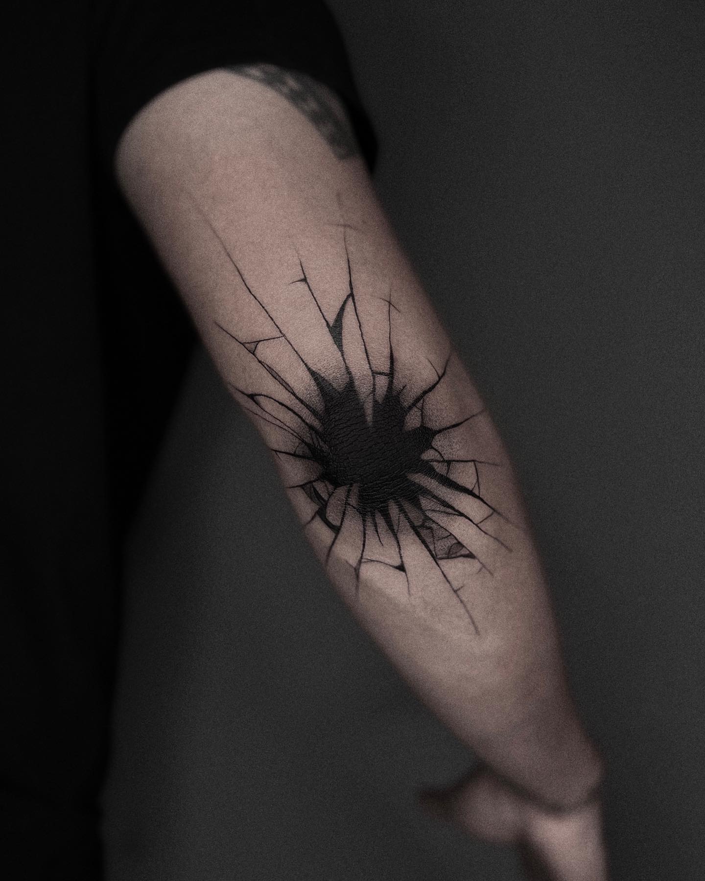 Shattered glass and ink going all over your elbow can represent your wish for renewal. If you’ve been dealing with negative, bad, and built-up emotions, try out this tattoo and show your growth and how you overcome fear.