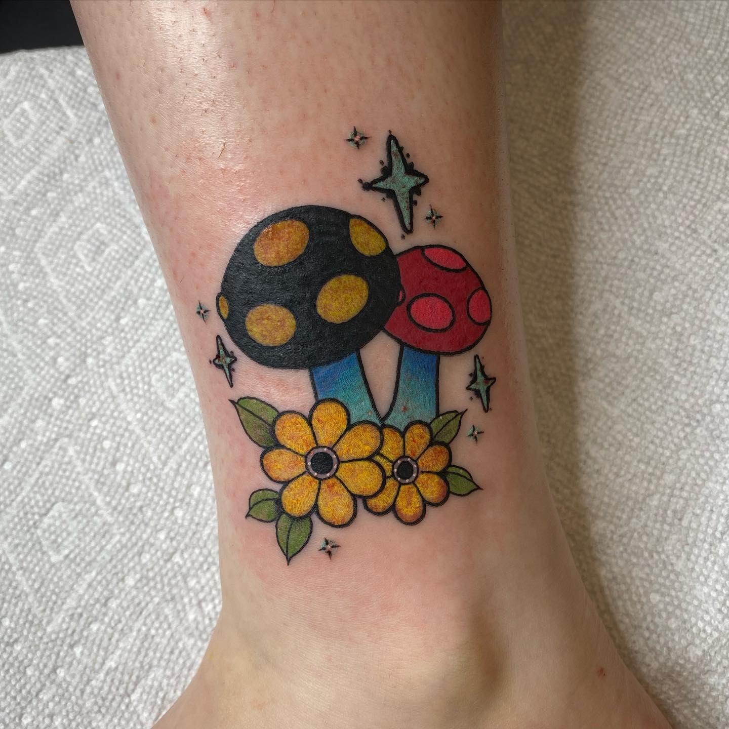 If you fancy bright and funky ideas, try out these cool loud mushrooms. This tattoo will show that you’re a wild person who likes to experiment with different elements and food in her life. Cool and flashy, this design can be attention-seeking when done the right way.