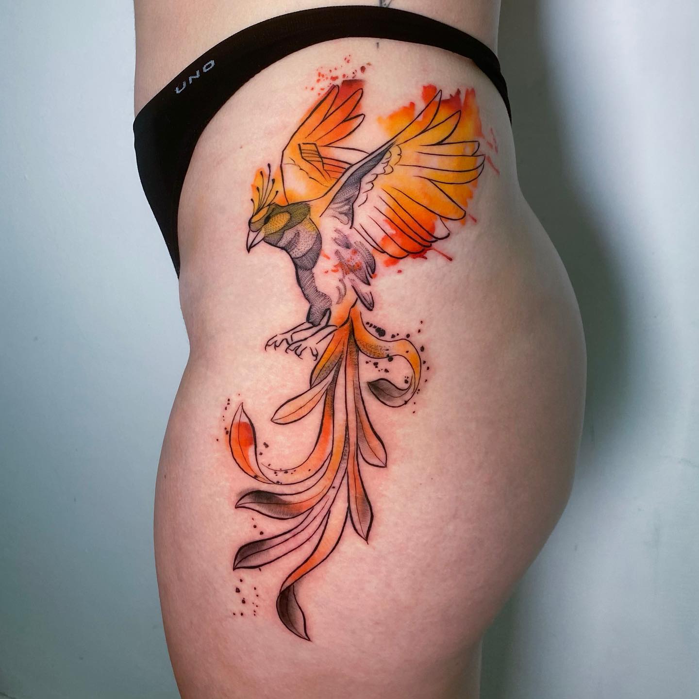 Cool thigh or hip tattoo that you’re going to enjoy if you’re into larger ideas. This bird design and Phoenix print will show your great and extravagant bold personality. If you’re a fan of cool and elegant ideas this will suit your character.