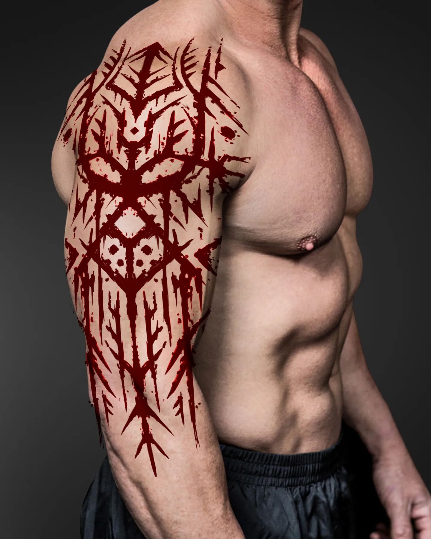 Men who work out and guys who are into large tribal ideas will fancy this red shoulder ink.