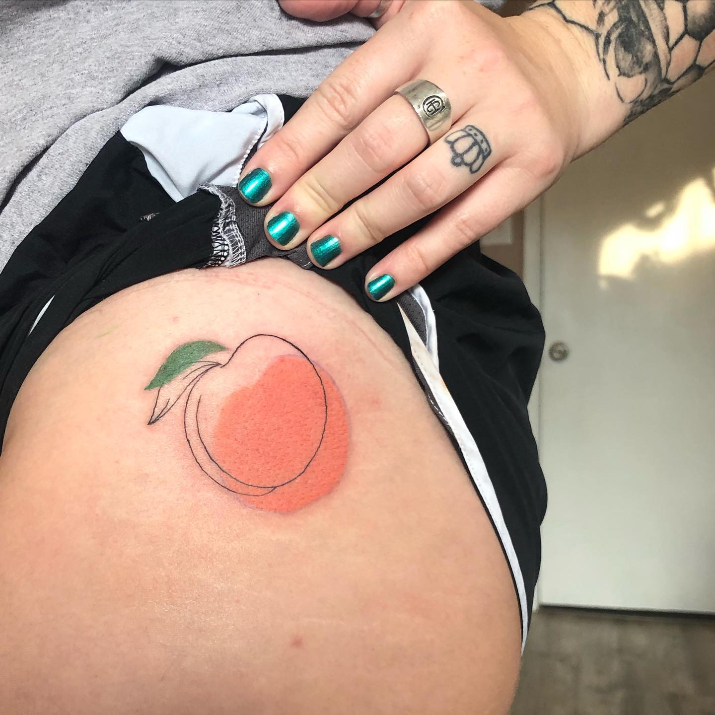 Cute, fun, and creative, this peach tattoo on a hip is a fun way of doing a tattoo and showing your inner crazy and wild side. If you’re a sexy sensual person this will look amazing on those who are wild and crazy.