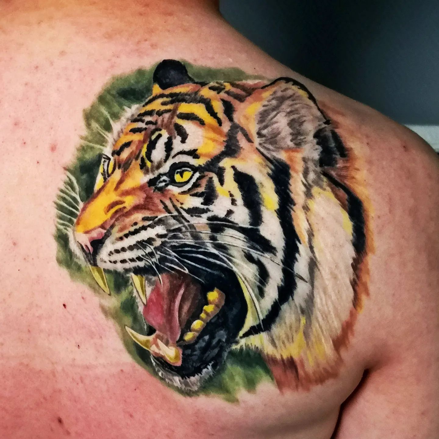 If there’s a tiger within you waiting to rise and shine + you’re someone who likes fierce bold symbols, give it a go with this tiger tattoo.