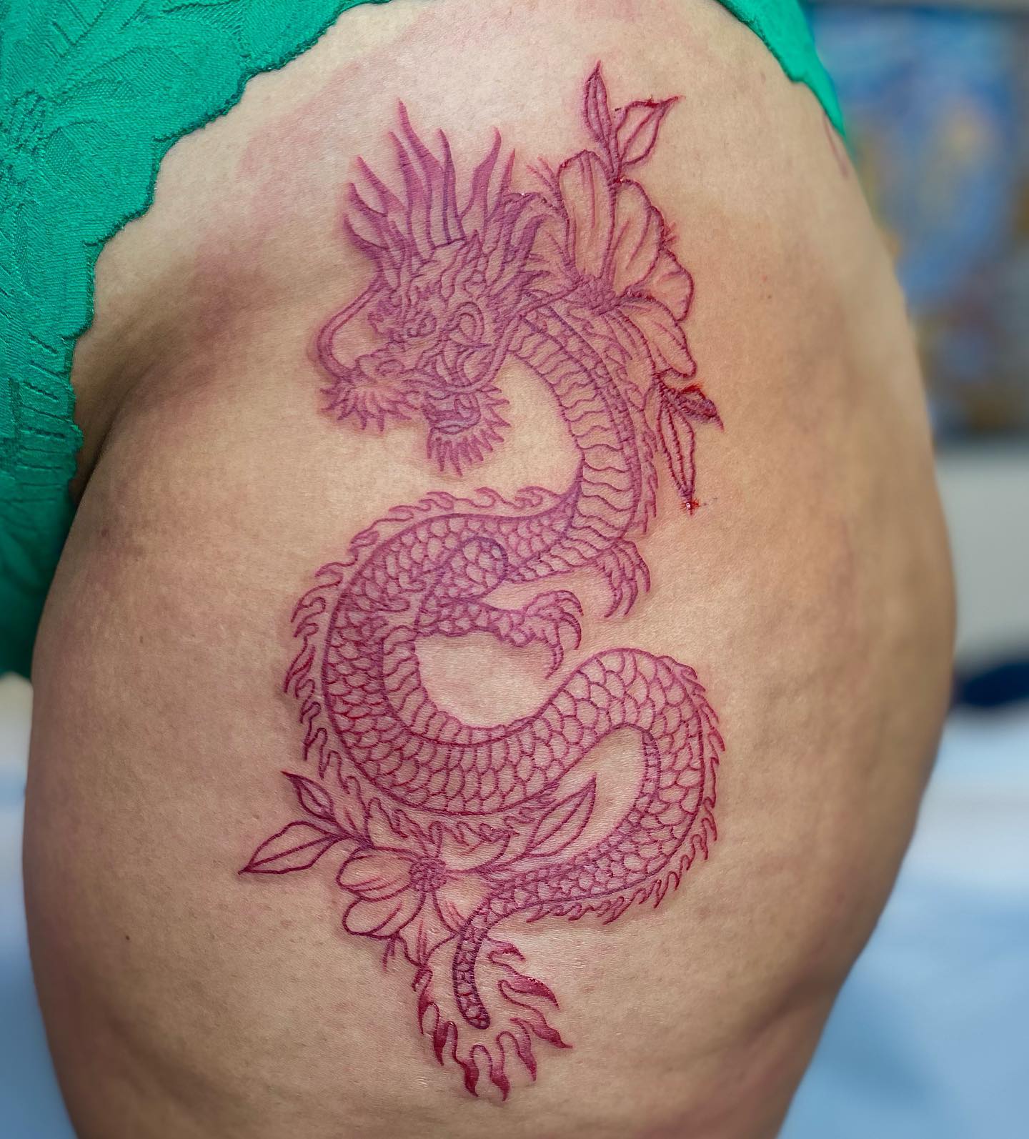 Giant red dragon that will look amazing on elegant and determined women. If you’re a natural leader or a conqueror in your life this large hip tattoo is the one for you.
