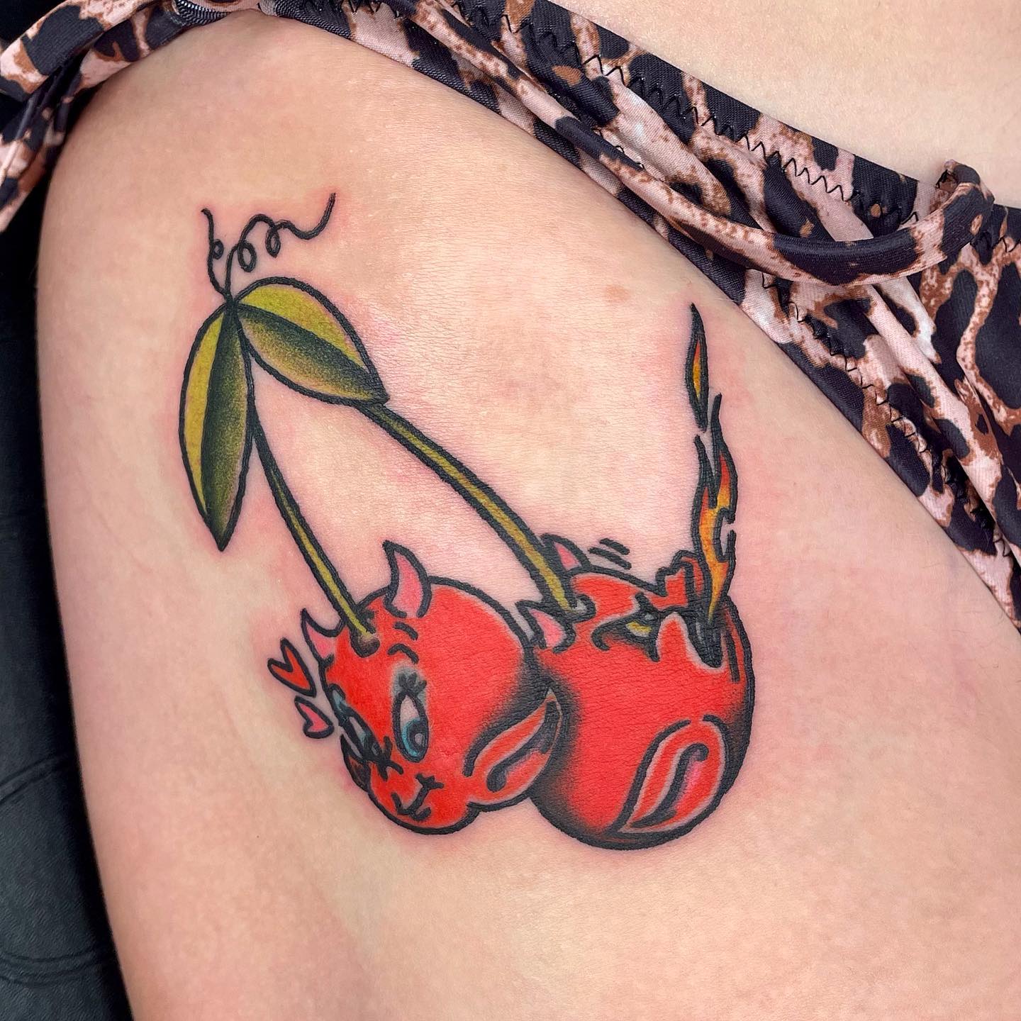 Small, bright red, and super fun, this little daredevil cherry tattoo is for those who like to look witty. Give this tattoo a go if you’re looking for something fun and cheerful.