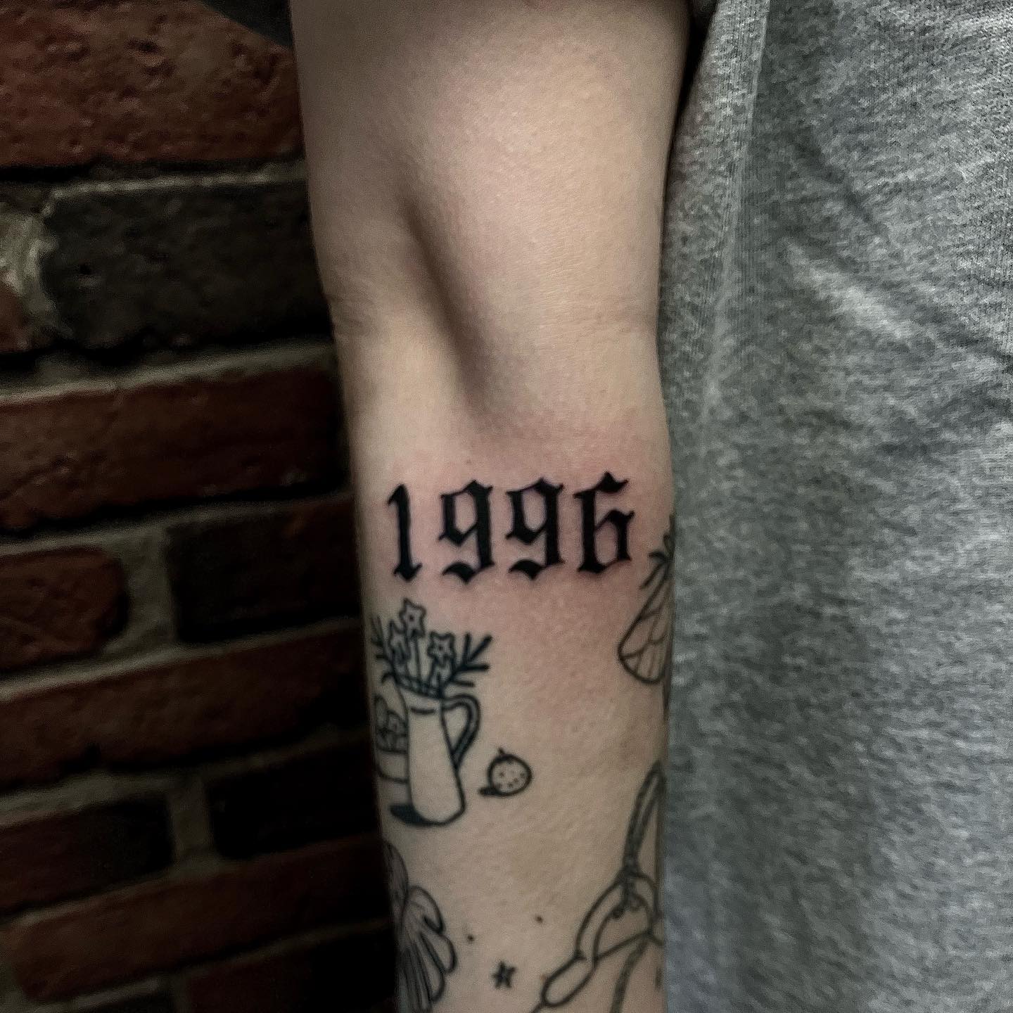 Place the date and time of your birth on your elbow if you wish that everyone knows it. You can also go for a tattoo of someone important in your life and someone who means a lot to you. Black giant ink such as this one is great for people who like bigger and flashier ideas.