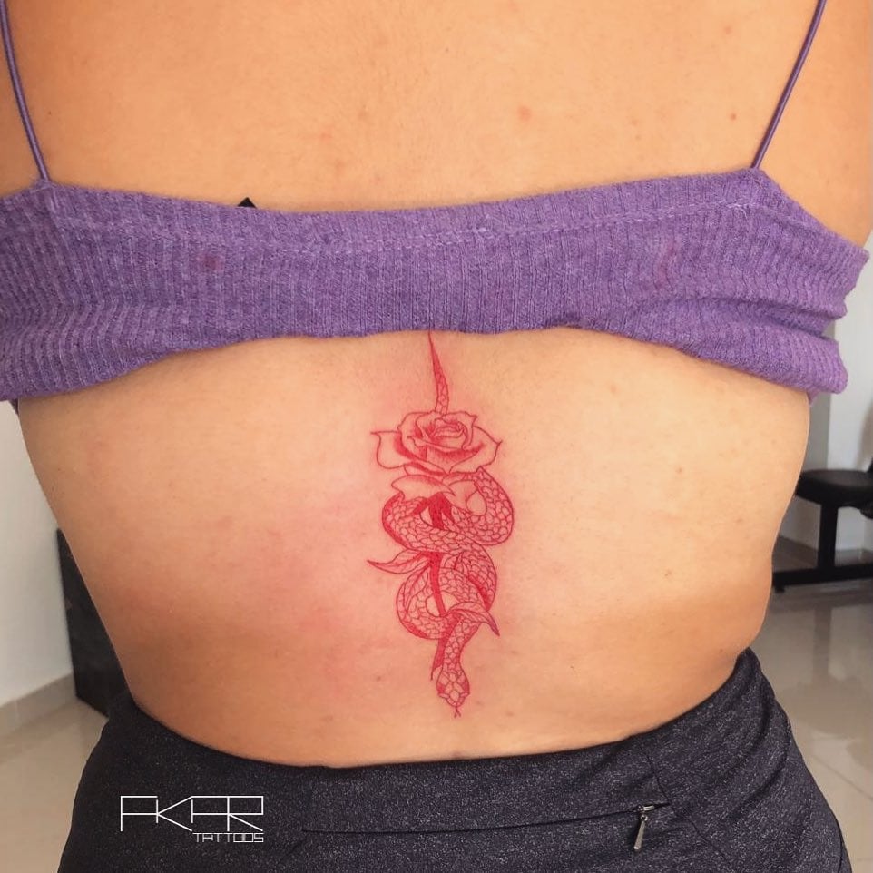 Cool red snake and flower tattoo that will symbolize your passion and emotions.