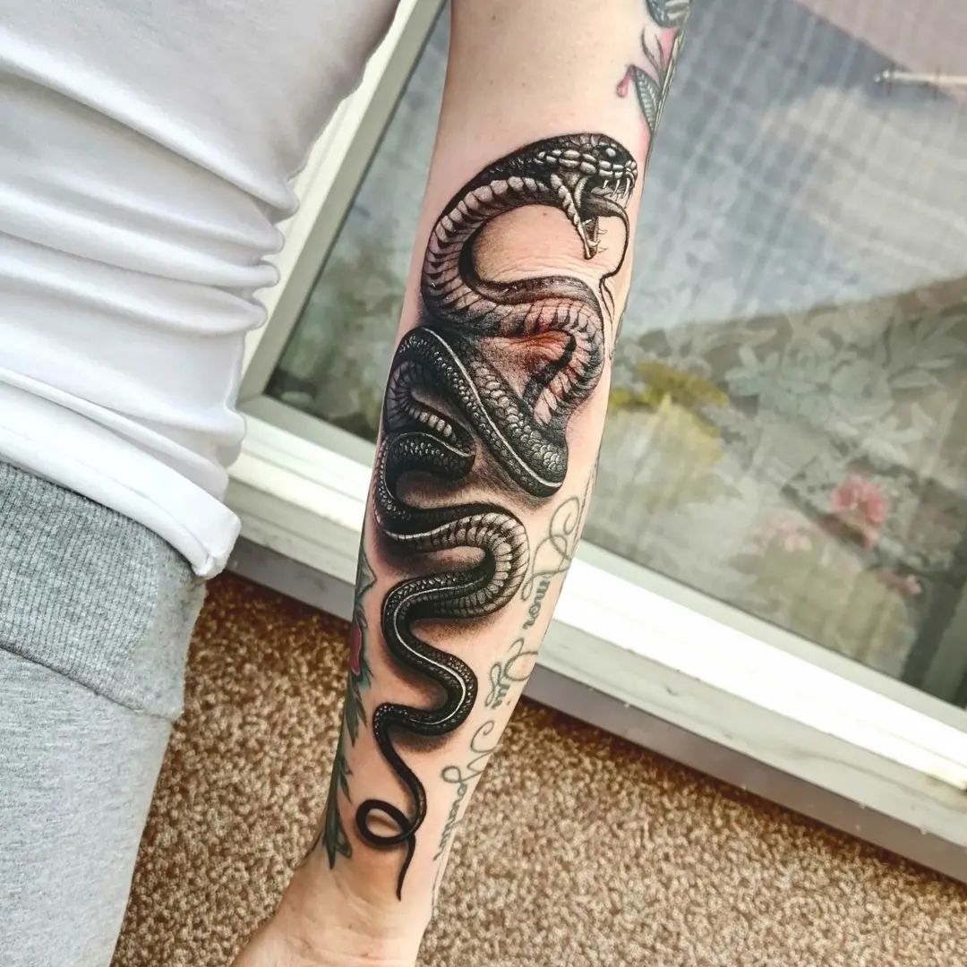 Snake elbow print can symbolize your inner warrior and how you can always find a way to fight through any negativities in your life. If you’ve ever been “poisoned” or if you’re very aware of things and people around you, try out this tattoo idea.