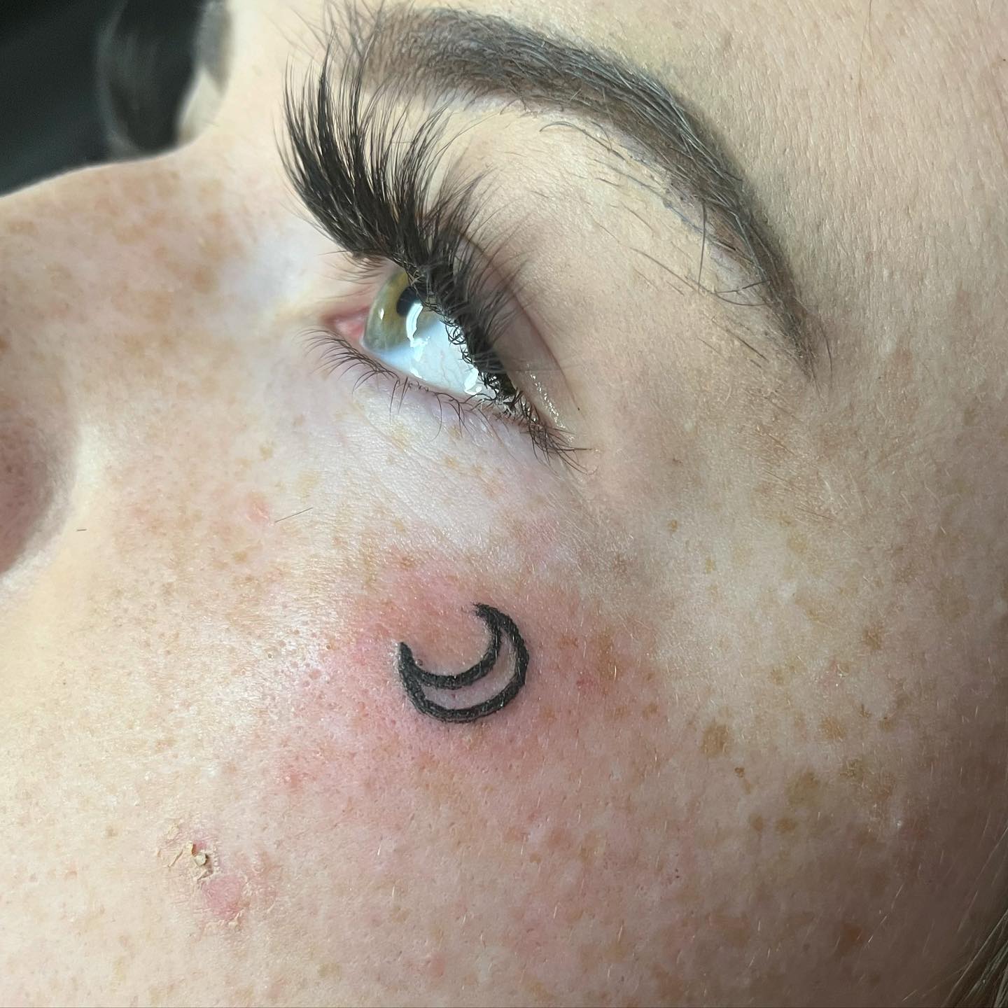 A small moon shape underneath your eye and on your cheek will symbolize your beliefs and how strong they truly are. You may even look like a mystical and spiritual person with this tattoo.