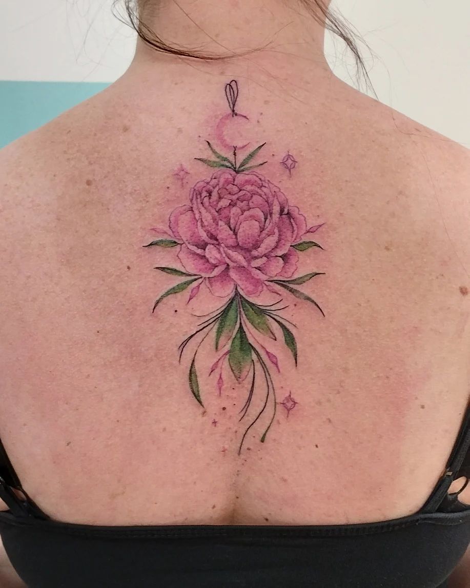 Pink and cute floral tattoo such as this one will let the world see you as a delicate little flower!