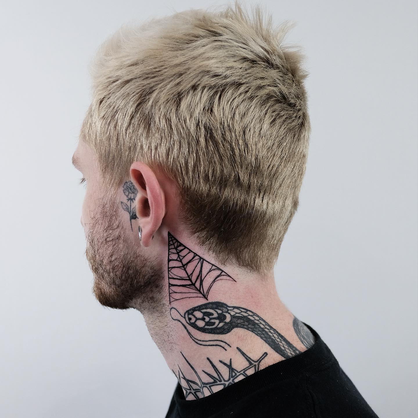 This neck tattoo is for those who dare to look bold and different. If your job allows you to rock something different and quirky, give it a go with this design.