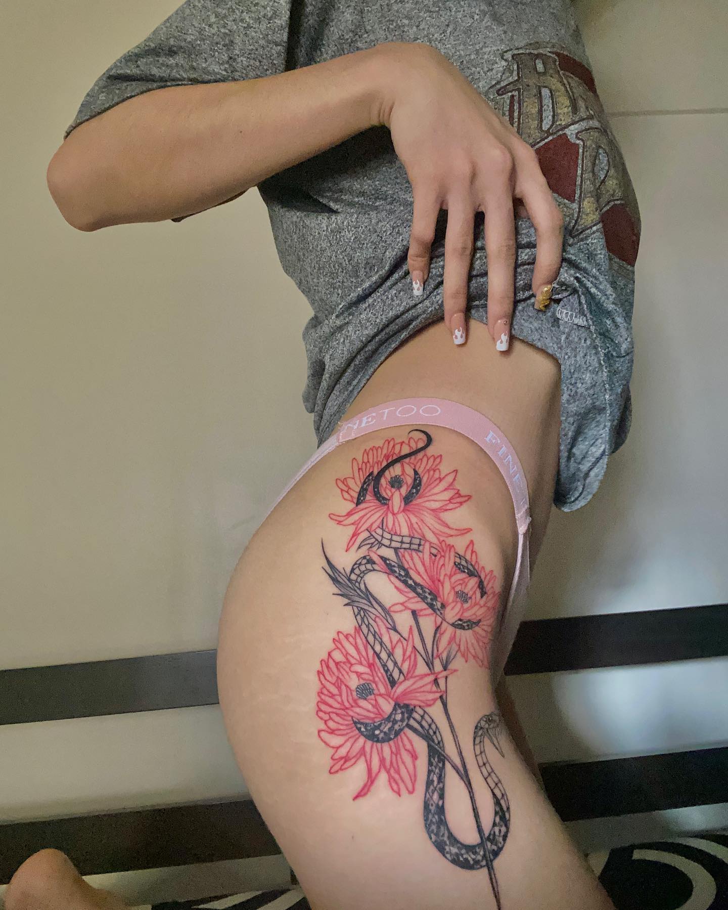 This hip tattoo with a dragon design is for women who are naturally feisty and bold. If you are all about glamour and you have a bold presence, this will suit you. Show it off if you fancy spring-inspired and elegant ideas.