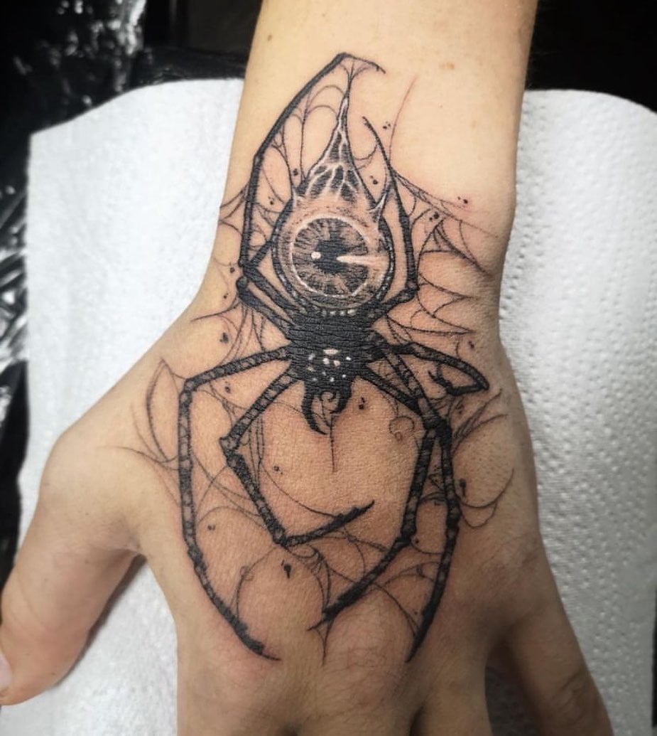 Try this palm tattoo if you fancy black and white ink. Guys who enjoy bold ideas and those who want to look fierce will like this spider print.