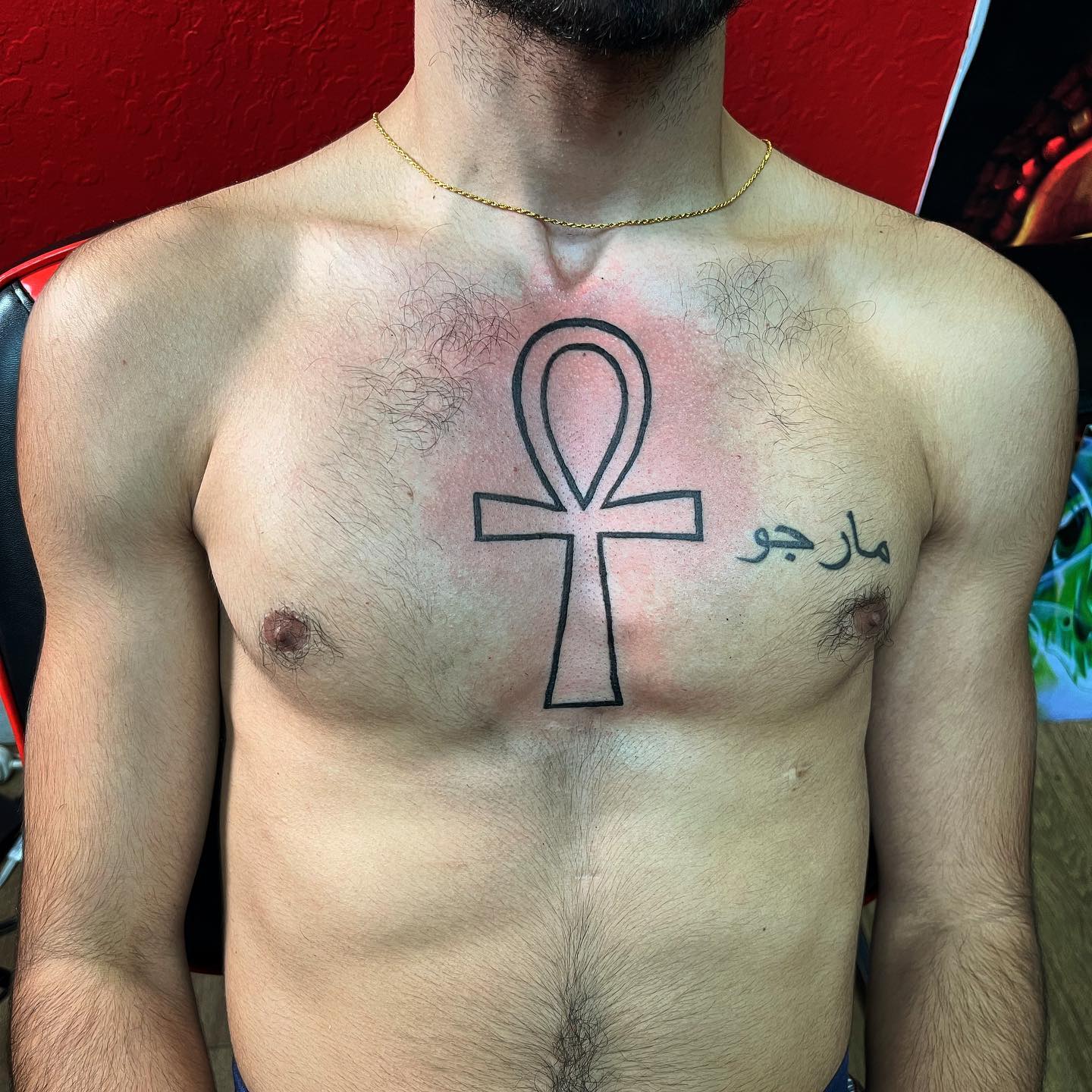 Tattoo Artist kind of messed up the ankh symbol Is it very noticable If  so can it be somehow fixed My only idea would be making a sleeve out of  it later