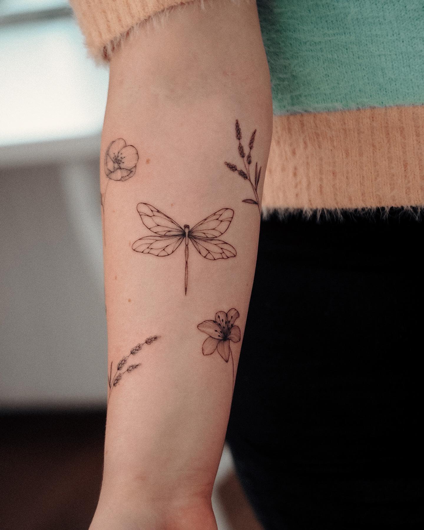 Simple Black Dragonfly Tattoo