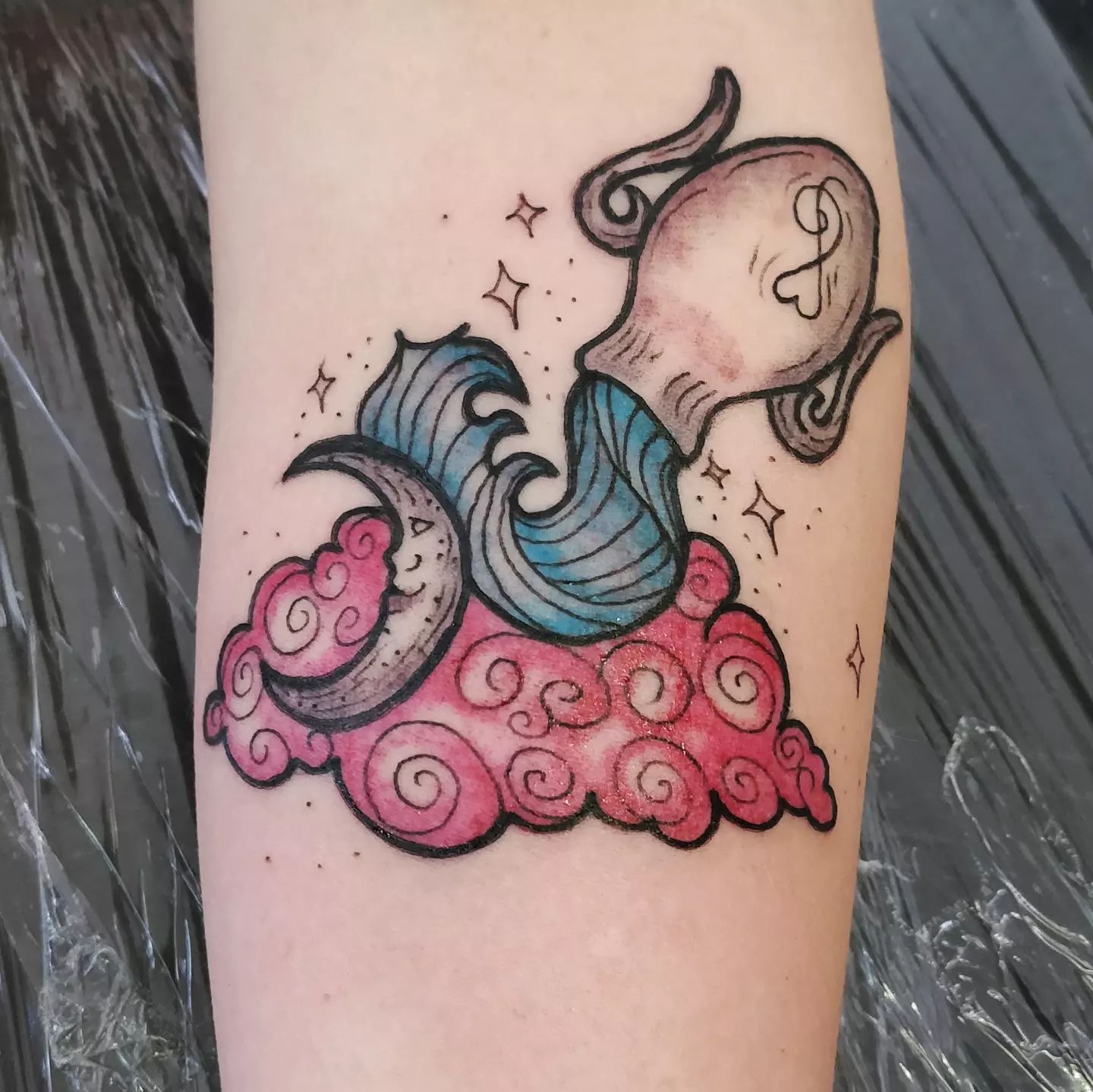 Are you ready to get a colorful zodiac sign tattoo? The water you bear is poured out to an imaginative cloud, which is pink. We all know that you guys are crazy and you think different than most of the people. It is time to be crazy for your tattoo this time!