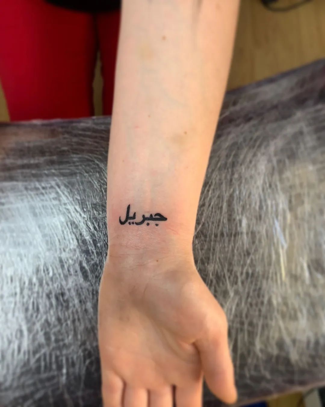 Hand tattoos are always a popular choice. Go for a small and chic Arabic lettering tattoo to look nice.