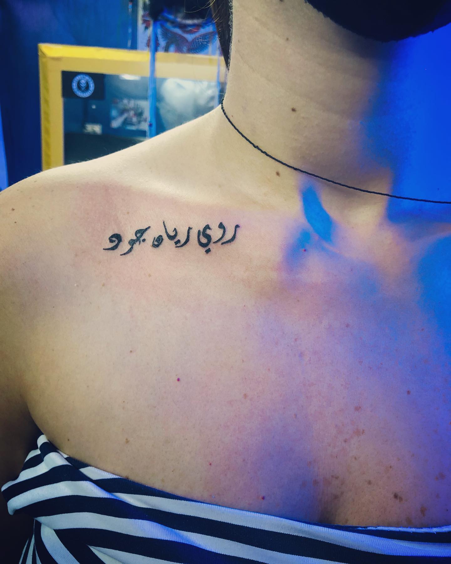 Collarbone is one of the sexiest part of the body, isn't it? An arabic lettering will look amazing on your body, for sure.