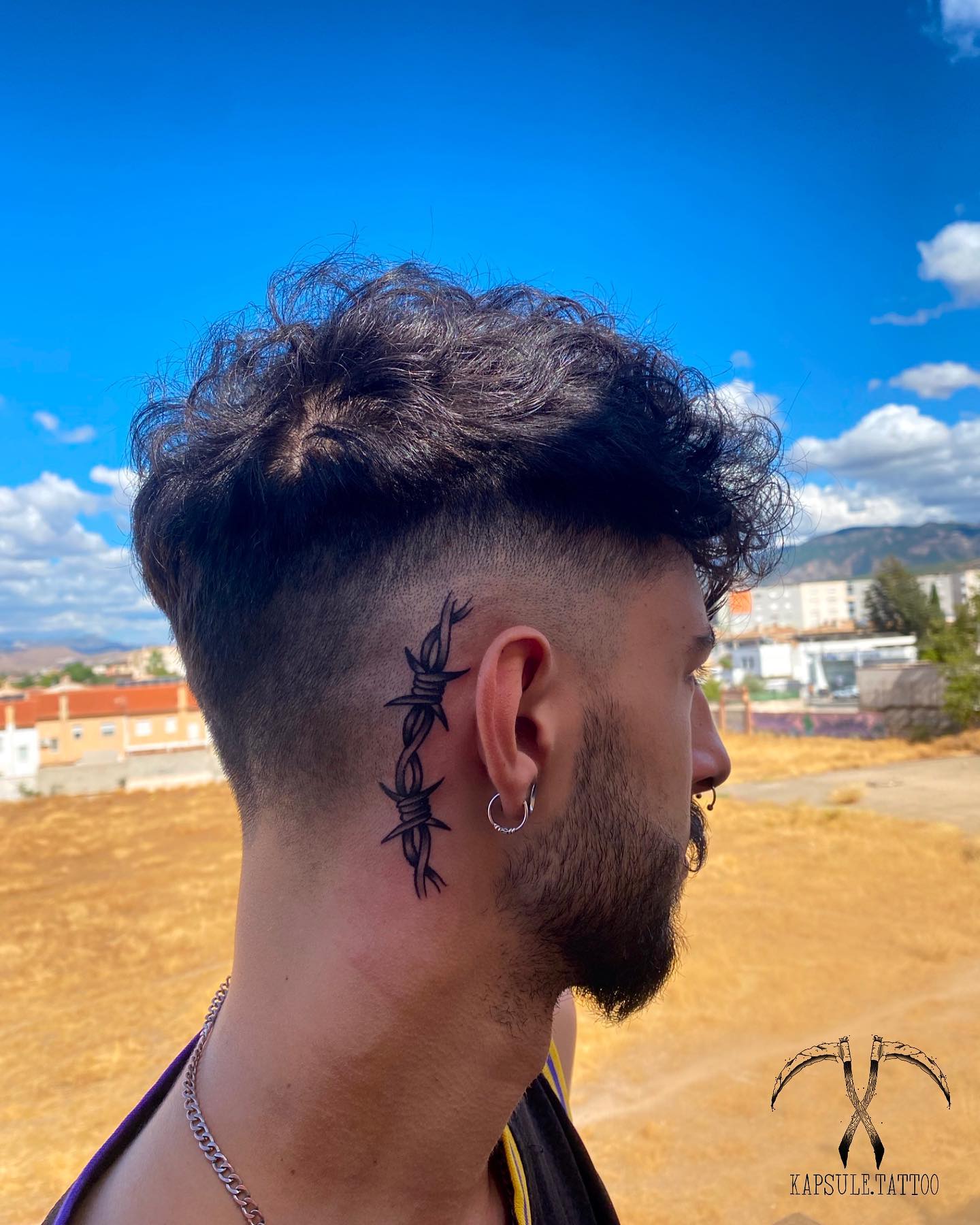 Getting a tattoo behind the ear is something that hurts but it seems like it's worth trying. A big size barbed wire will make you shine out with its perfect shading. Everyone will realize your tattoo every time you turn your head.