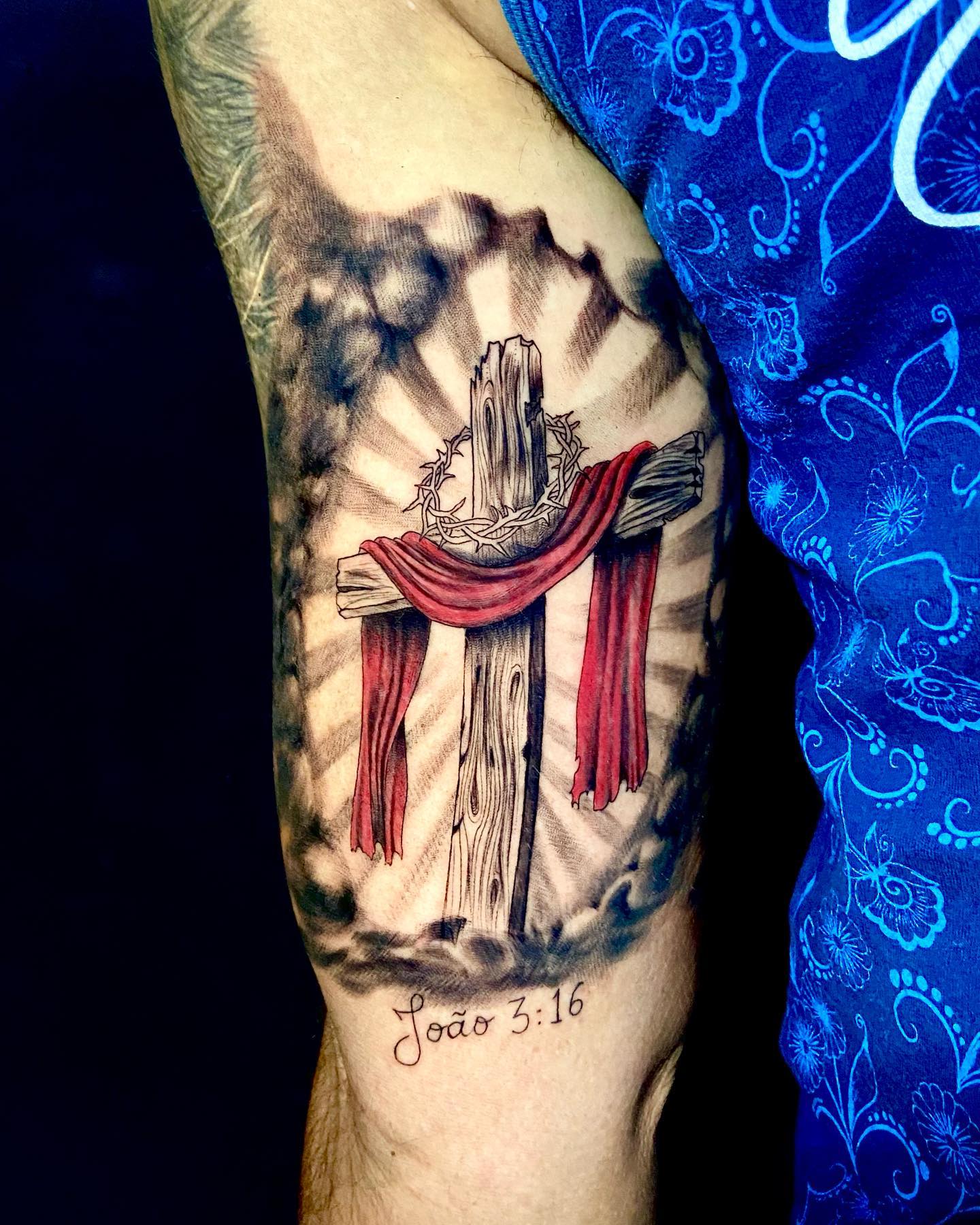 To make your religious tattoo full of meanings, you can mix related things. For example, on a wood cross, you can place the barbed wire crown that Jesus wore during crucifixion. He was forced to wear it before his death, so it is a special representation of Christian faith.