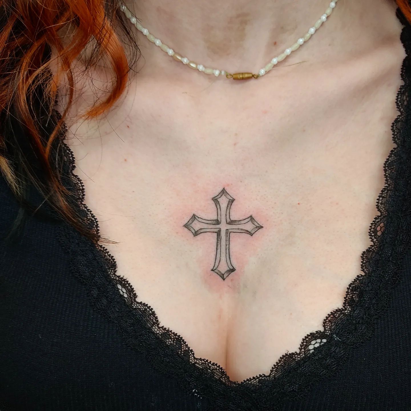 Back of neck tiny celtic cross tattoo