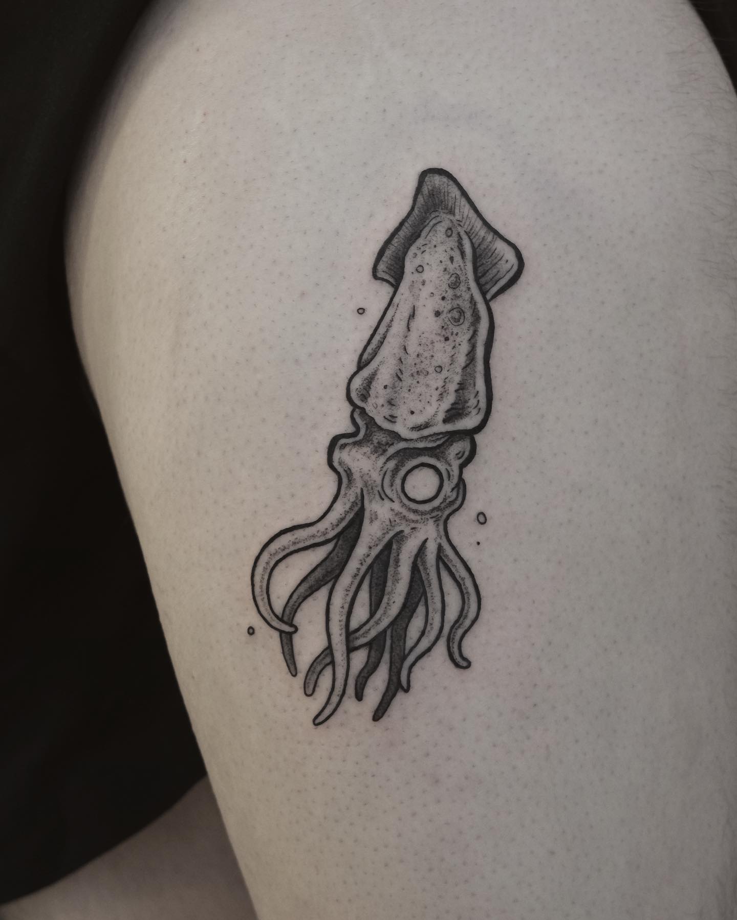 Having a detailed squid tattoo will be a good choice if you like aquatic animals. You may go for a squid like the one above.