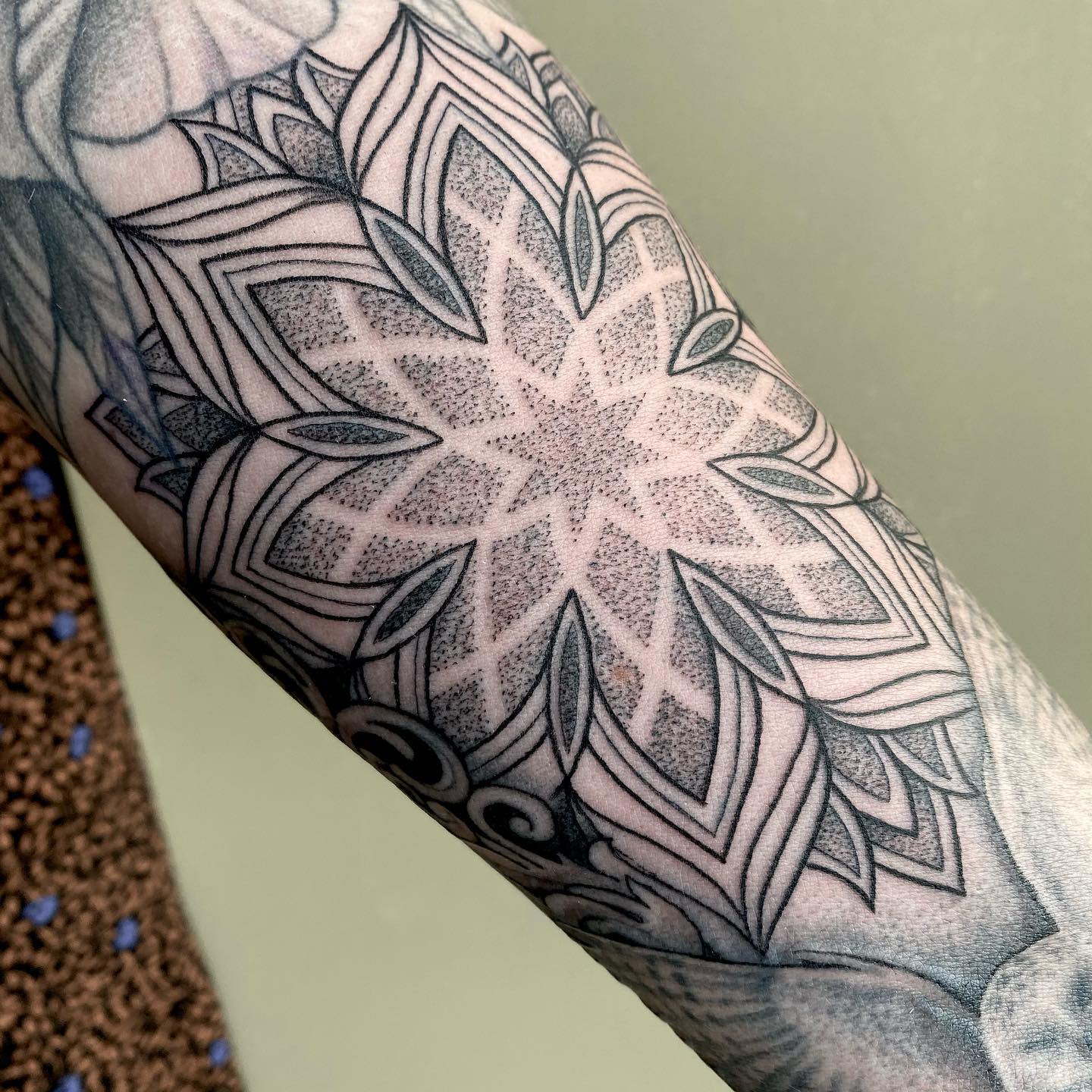 A cool mandala design tattoo on sleeve is all you need to take your dotwork tattoo to a whole different level. It covers all of your sleeve and looks amazing.
