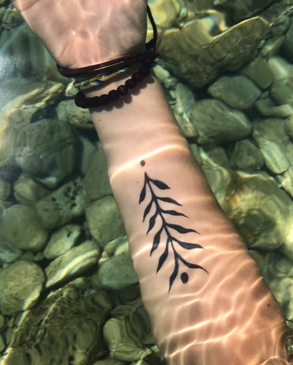 Just a simple leaf tattoo is all you need to rock. It’s not a small one but this medium-size leaf tattoo is perfect. Show your love of sea with it.