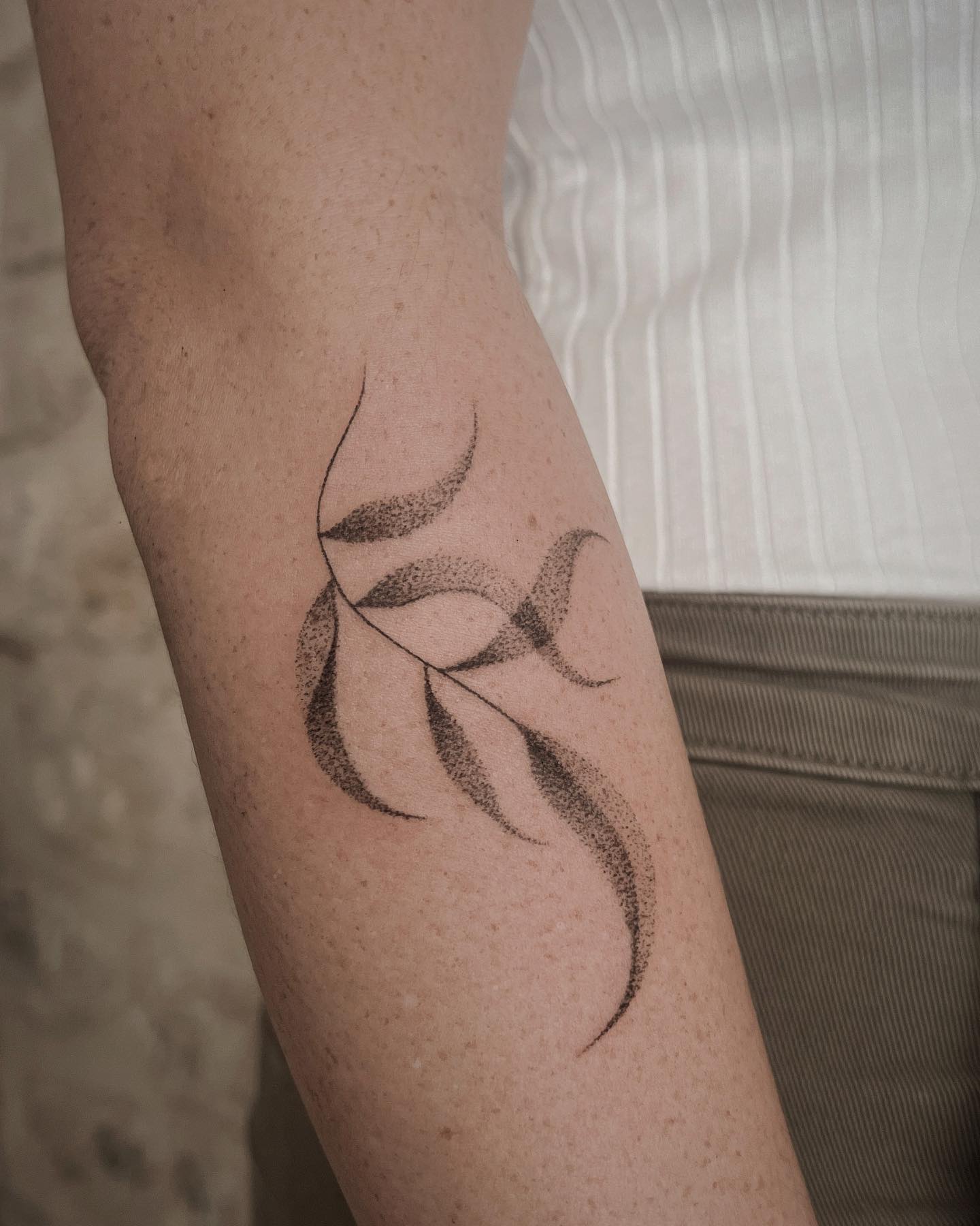 A lot of dots get together and they form these beautiful and gorgeous leaves. Dotwork tattoos are mostly simple and minimal but when you look at the whole tattoo, you see that there is a perfection in simplicity.